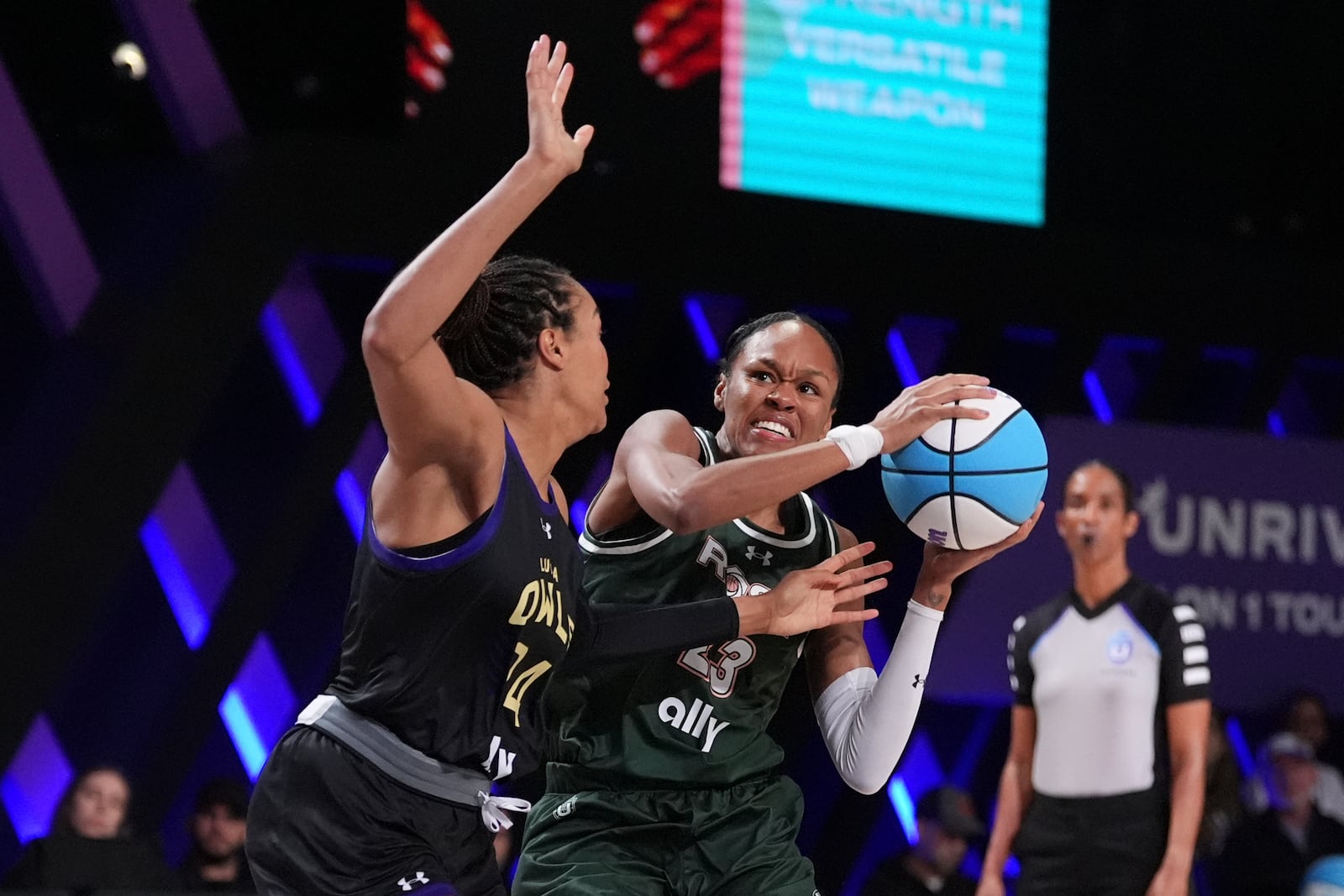 Azura Stevens goes for the basket defended by Napheesa Collier in their Unrivaled 1-on-1 basketball semifinal, Friday, Feb. 14, 2025, in Medley, Fla. (AP Photo/Rebecca Blackwell)