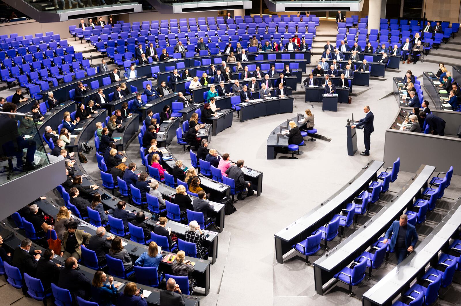 German opposition leader and Christian Union parties floor leader Friedrich Merz speaks after the debate and a voting about migration at the German parliament Bundestag in Berlin, Germany, Wednesday, Jan. 29, 2025. (AP Photo/Markus Schreiber)