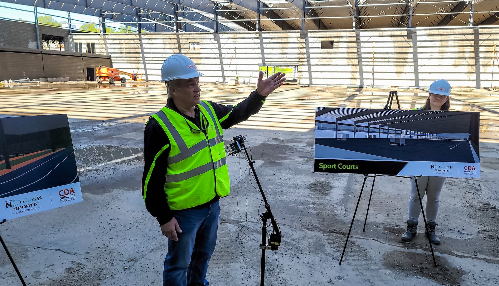 Sam Beiler, founder of Spooky Nook Sports, speaks during a media tour of Spooky Nook Sports Champion Mill complex under construction Friday, April 30, 2021 in Hamilton. The sports complex side and convention and hotel space combined will be over 1 million sq. feet when completed. Mill One will feature a fitness center, climbing and adventure center, hardwood courts, sports courts, turf fields and more. Mill Two by the river is the conference center and will feature 233 hotel rooms, 16 conference rooms and 60,000 sq. feet of tenant/ lease space. NICK GRAHAM / STAFF