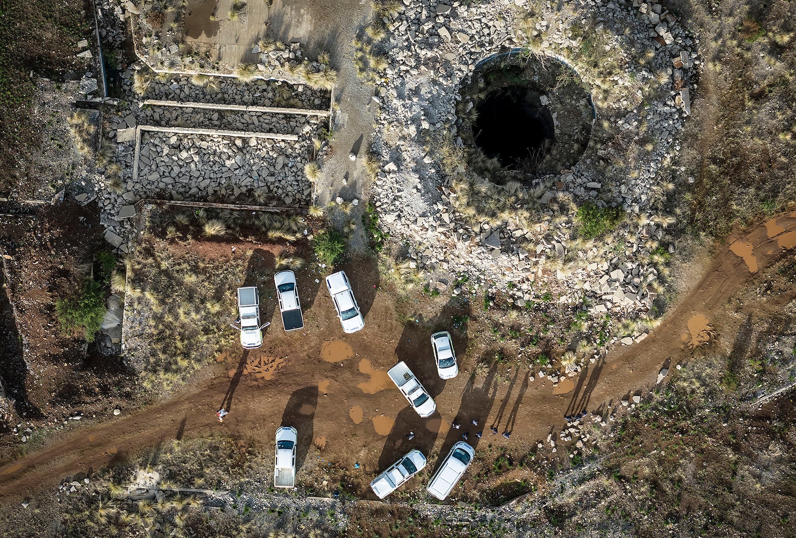 An aerial view of a mine shaft where an estimated 4000 illegal miners are trapped in a disused mine in Stilfontein, South Africa, Wednesday, Nov.13, 2024. (AP Photo)