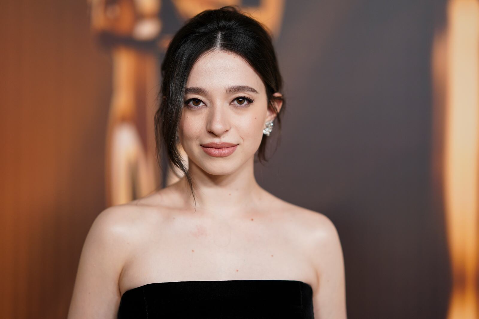 Mikey Madison arrives at the Oscars Nominees Dinner on Tuesday, Feb. 25, 2025, at the Academy Museum of Motion Pictures in Los Angeles. (Photo by Jordan Strauss/Invision/AP)