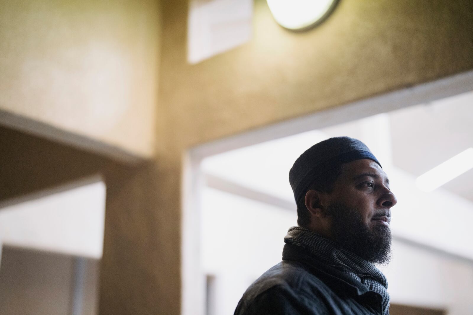 Junaid Aasi, a volunteer imam at an Altadena mosque that was gutted in the Eaton fire, speaks during a community gathering to discuss plans for Ramadan held at a school in Pasadena, California, Saturday, Feb. 15, 2025. (AP Photo/Eric Thayer)