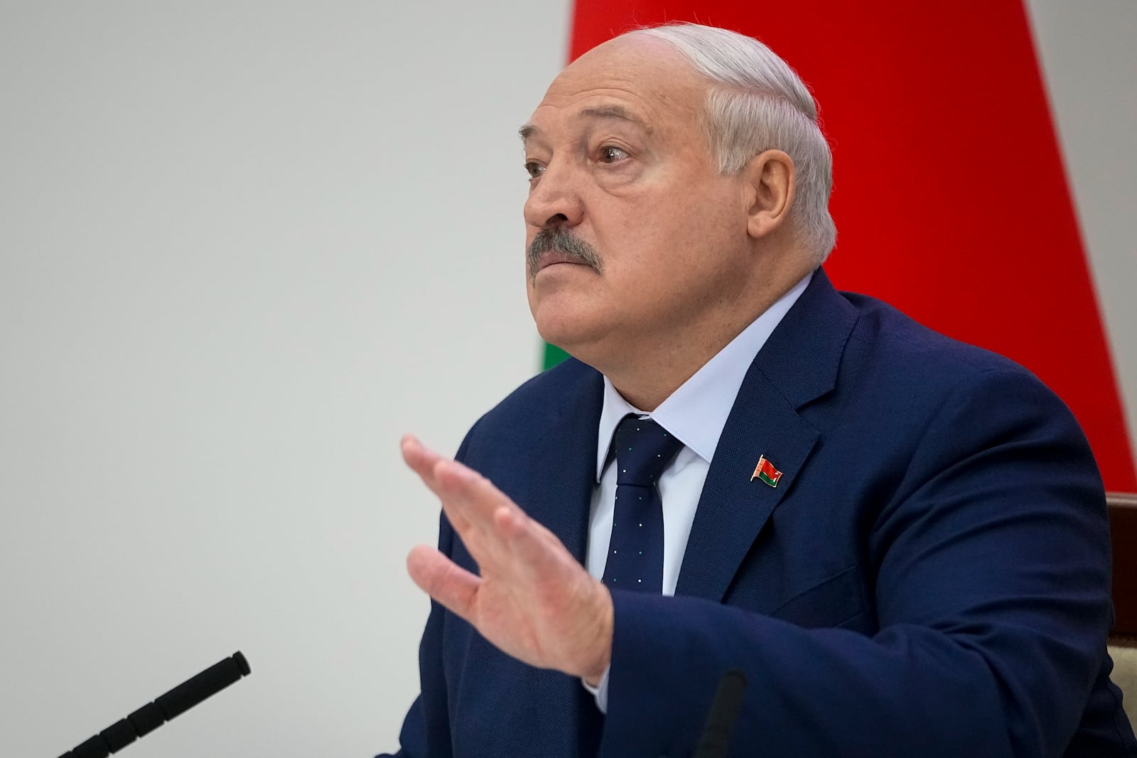 Belarusian President Alexander Lukashenko gestures while speaking to the media after voting in presidential elections in Minsk, Belarus, Sunday, Jan. 26, 2025. (AP Photo/Pavel Bednyakov)