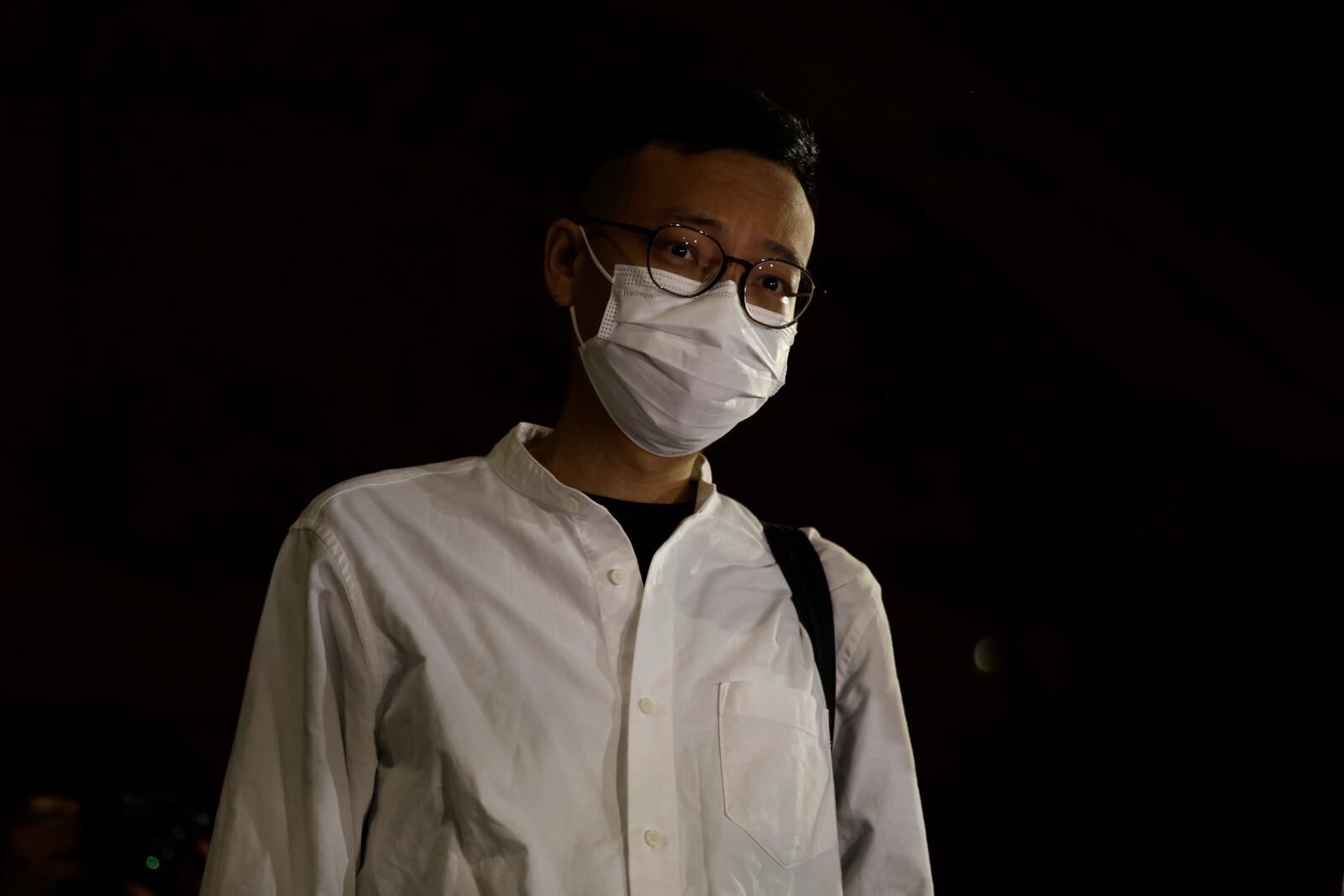 Patrick Lam, the former acting editor-in-chief of Hong Kong's now shuttered pro-democracy news outlet Stand News leaves the Wanchai District Court after the final sentencing of Stand News sedition case, in Wan Chai district court in Hong Kong on Thursday, Sept. 26, 2024. (AP Photo/May James)