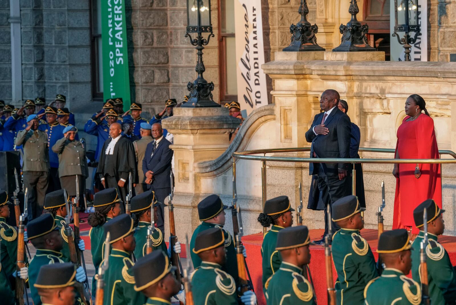 South African President Cyril Ramaphosa gestures for the national anthem from the steps of Cape Town's city hall before delivering his annual state of the union address, Thursday, Feb. 6, 2025. (AP Photo/Nardus Engelbrecht)