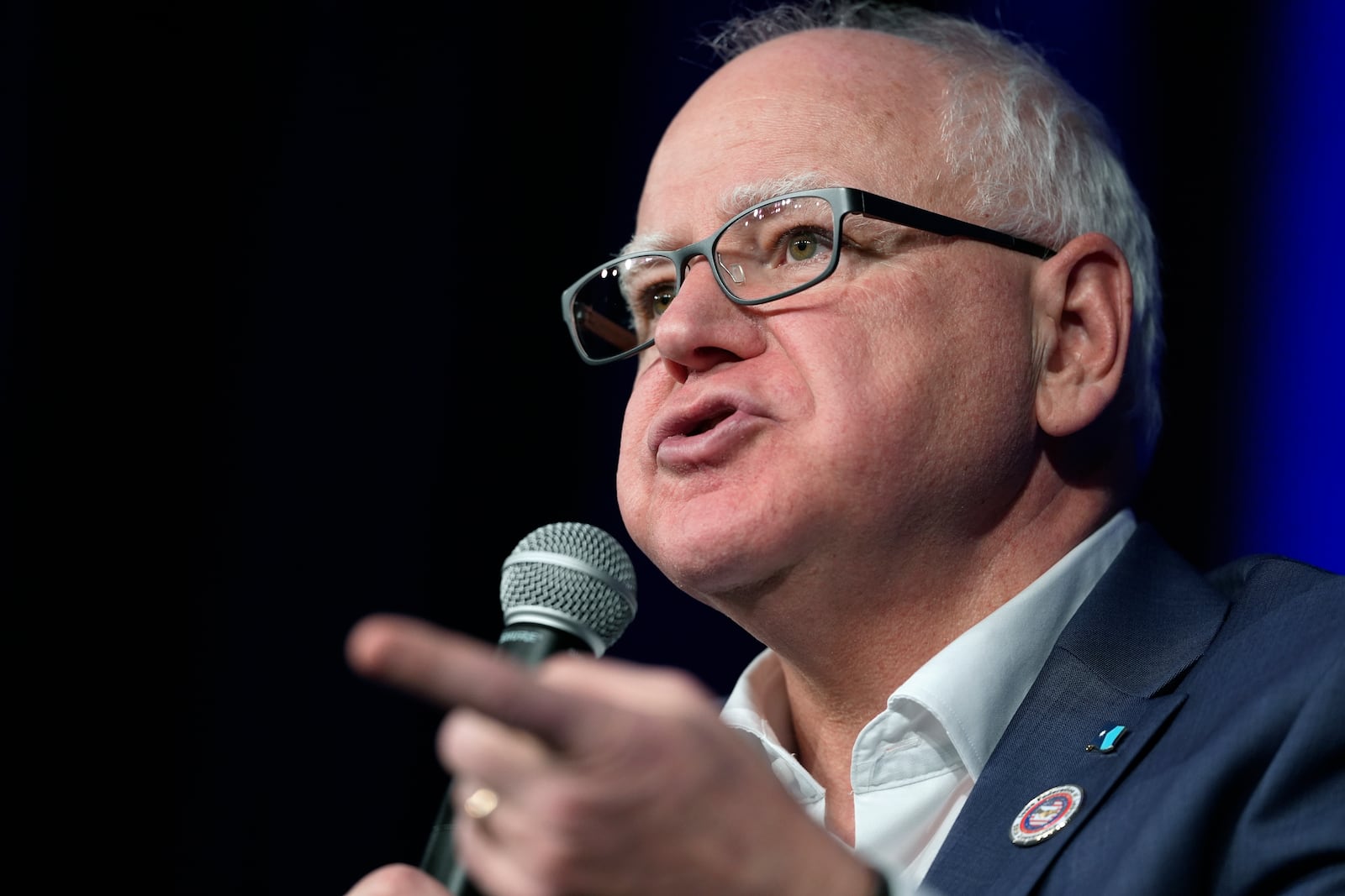 Minnesota Gov. Tim Walz speaks at a town hall event at Roosevelt High School, Friday, March 14, 2025, in Des Moines, Iowa. (AP Photo/Matthew Putney)