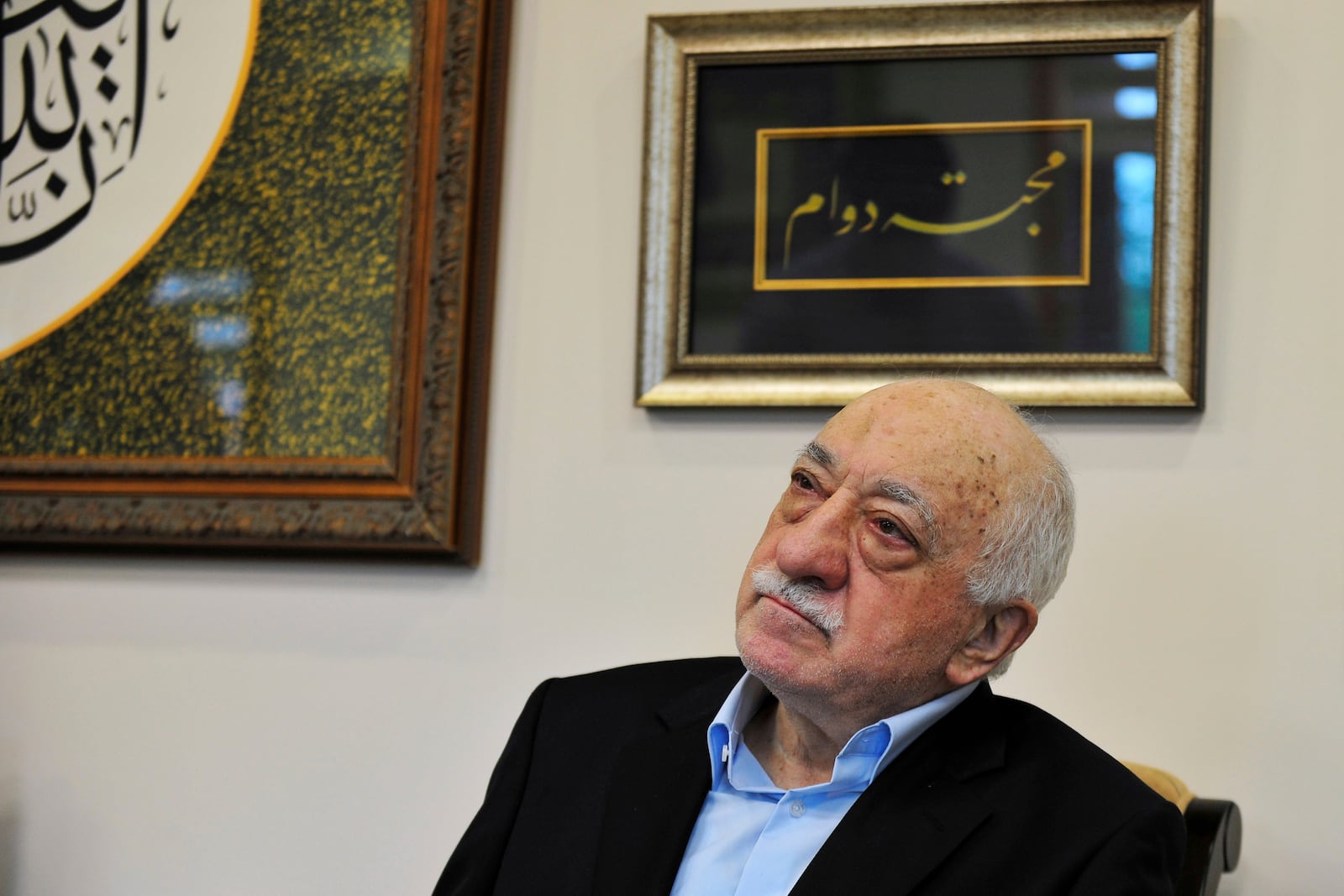 FILE - Turkish Islamic cleric Fethullah Gulen meets members of the media at his compound in Saylorsburg, Pa. in July 2016. (AP Photo/Chris Post, File)