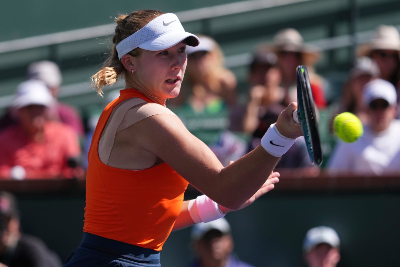 Mirra Andreeva, of Russia, returns to Aryna Sabalenka, of Belarus, during the final match at the BNP Paribas Open tennis tournament Sunday, March 16, 2025, in Indian Wells, Calif. (AP Photo/Mark J. Terrill)