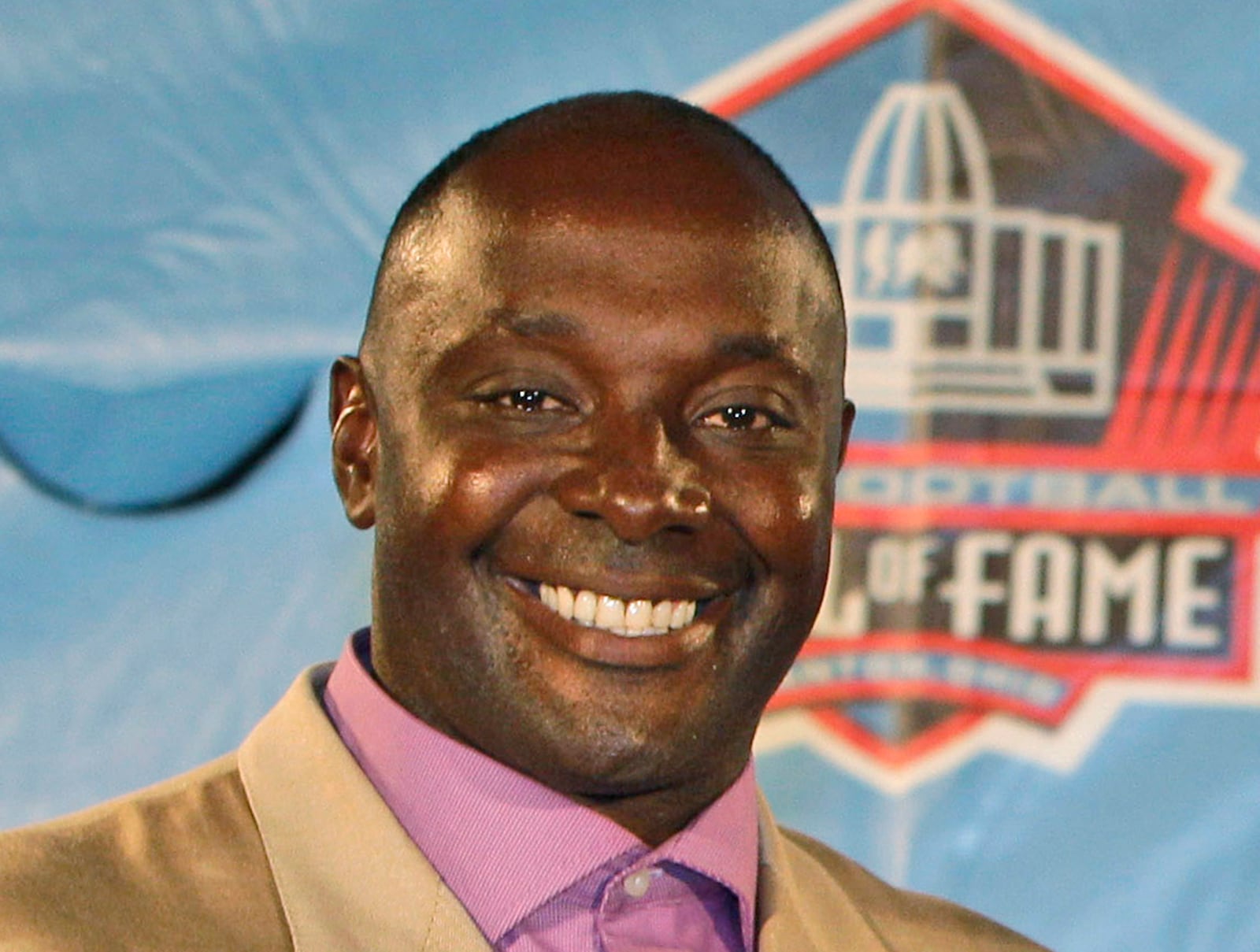 FILE - This shows Sterling Sharpe at the Pro Football Hall of Fame in Canton, Ohio, on Aug. 6, 2011. (AP Photo/Tony Dejak, File)