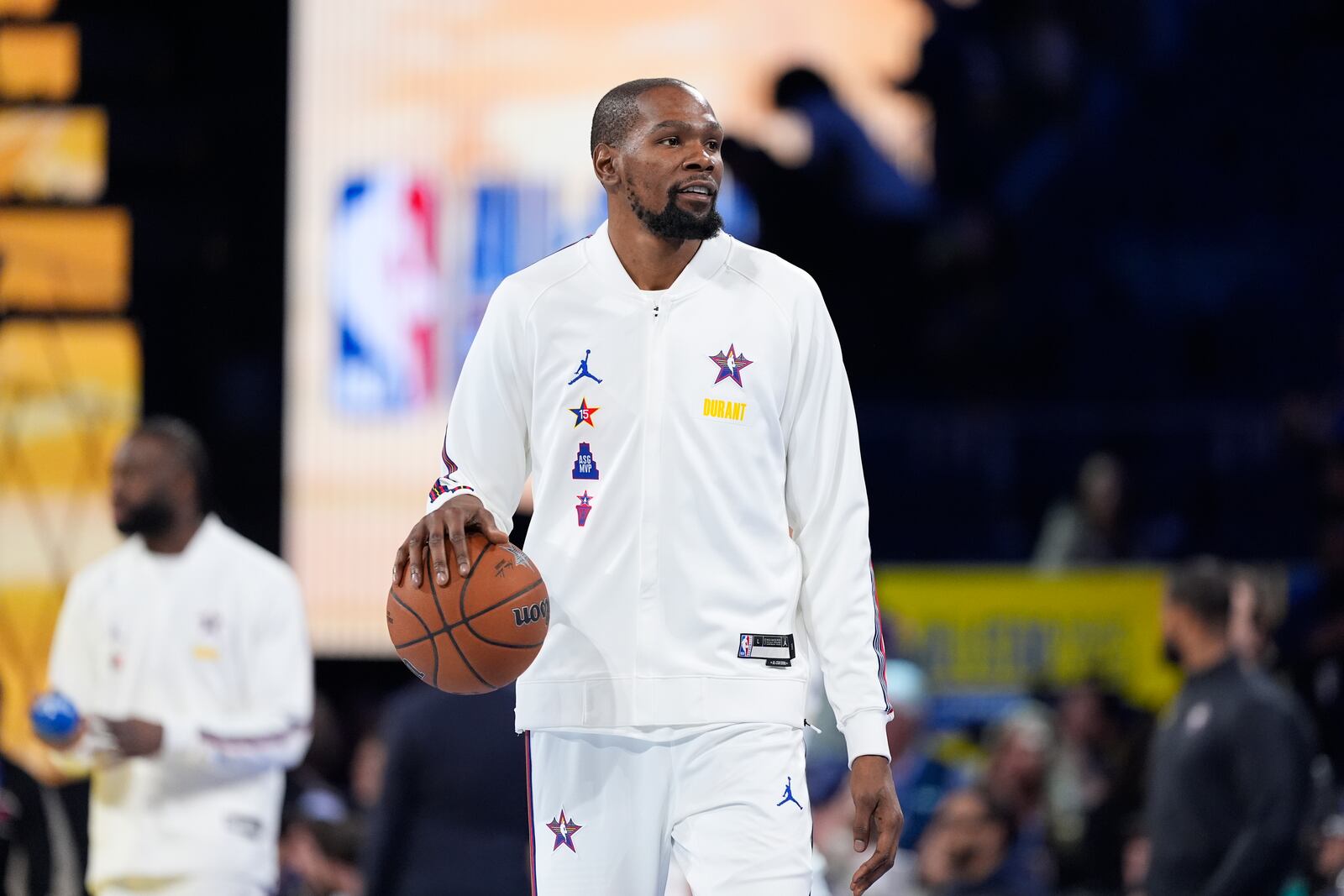 Phoenix Suns forward Kevin Durant warms up before the NBA All-Star basketball game Sunday, Feb. 16, 2025, in San Francisco. (AP Photo/Godofredo A. Vásquez)