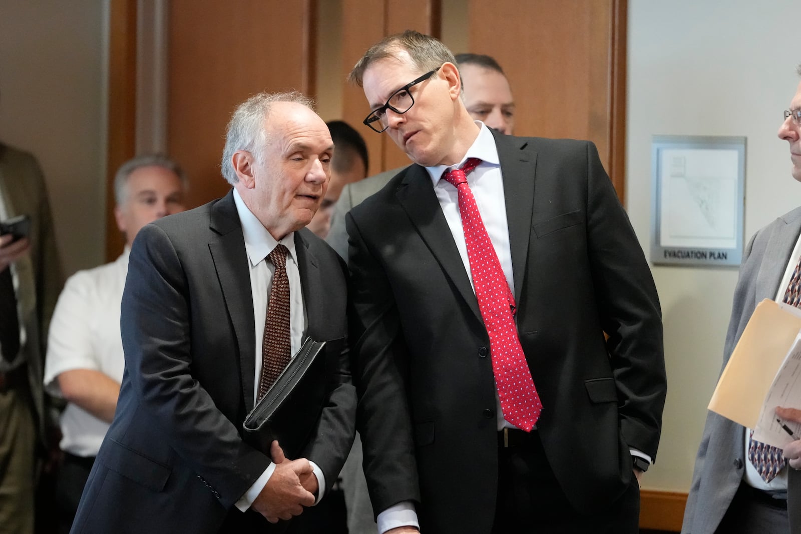 Jim Troupis appears in a Dane County courtroom with his attorney Joseph Bugni Wednesday, Dec. 12, 2024, in Madison, Wis. (AP Photo/Morry Gash)