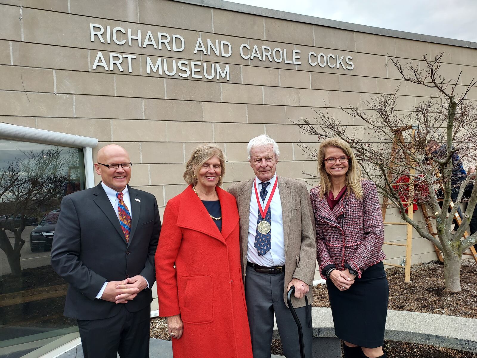 The Miami University Art Museum in Oxford is now the Richard and Carole Cocks Art Museum because of a large financial donation the Cocks family made. They are longtime donors to the museum. Richard Cocks is the second from the right in this photo taken Friday. MIAMI UNIV./CONTRIBUTED