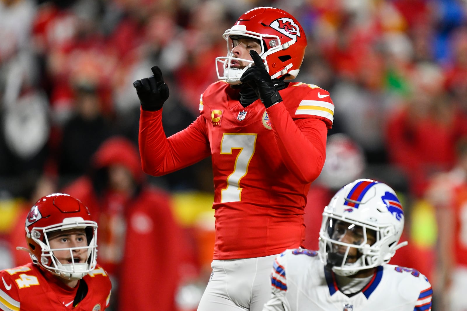 Kansas City Chiefs place kicker Harrison Butker (7) reacts to his field goal against the Buffalo Bills during the second half of the AFC Championship NFL football game, Sunday, Jan. 26, 2025, in Kansas City, Mo. (AP Photo/Reed Hoffmann)