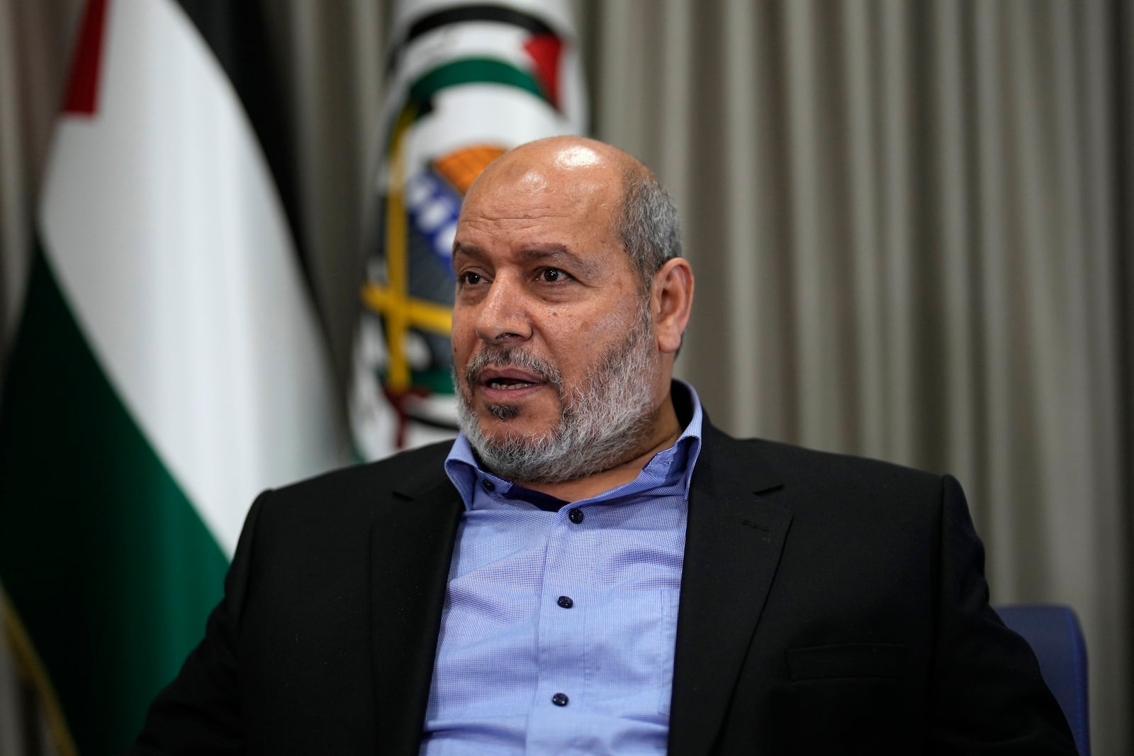 FILE - Khalil al-Hayya, a high-ranking Hamas official who has represented the Palestinian militant group in negotiations for a cease-fire and hostage exchange deal, speaks during an interview with The Associated Press, in Istanbul, Turkey, on April 24, 2024. (AP Photo/Khalil Hamra, File)