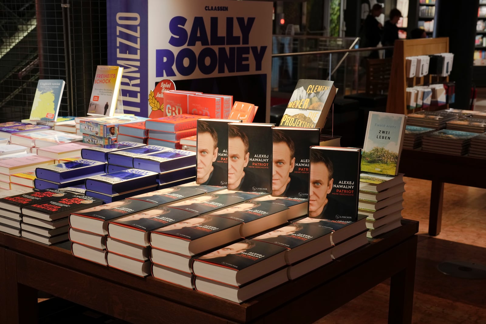 Copies of the late Russian opposition leader Alexei Navalny's memoir entitled 'Patriot' are put display on the first day of sale in a bookshop in Berlin, Germany, Tuesday, Oct. 22, 2024. (AP Photo/Markus Schreiber)