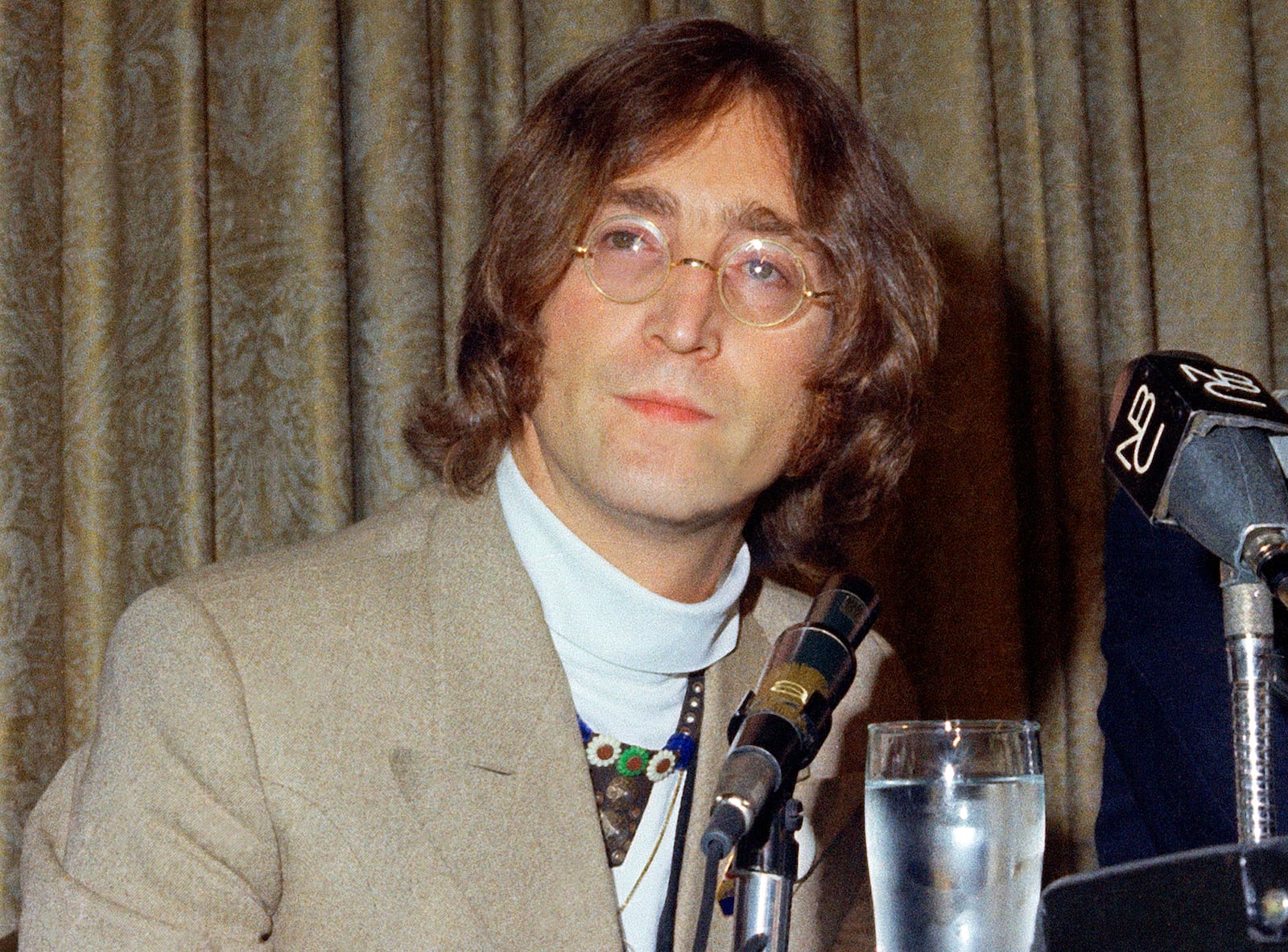 FILE - Singer John Lennon appears during a press conference at the Hotel Americana on May 13, 1968, in New York. (AP Photo, File)