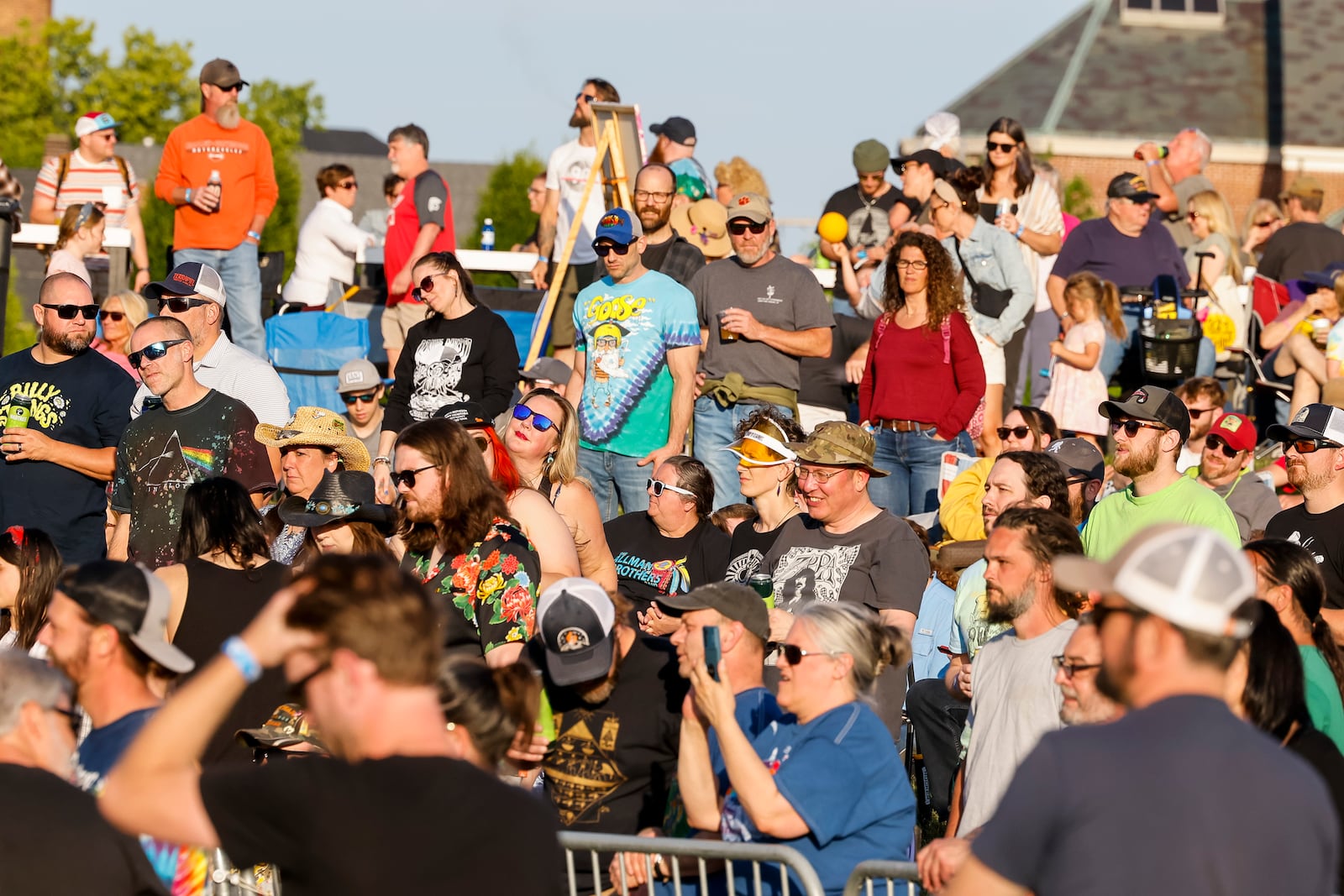 People gather at Marcum Park for the first concert of the season Thursday, May 25, 2023 at RiversEdge Amphitheater in Hamilton. Daniel Donato's Cosmic Country! kicked off the night and Eggy closed out the evening. NICK GRAHAM/STAFF