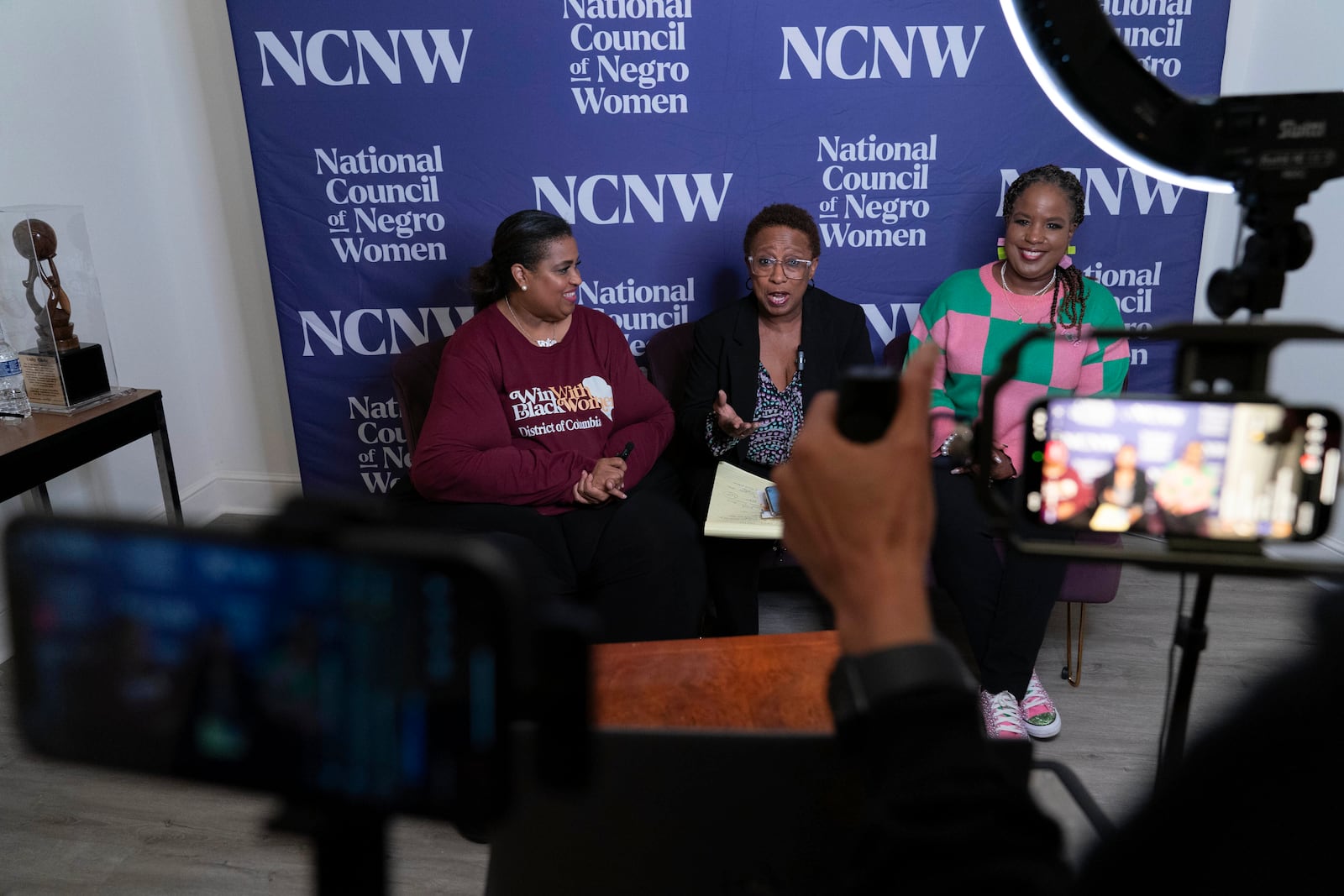 Members of the Black Women's Leadership Collective from left; Holli Holliday, President, Sisters Lead Sisters Vote & lead organizer, Win With Black Women, Portia Reddick White, Vice President Advocacy and Policy, National Council of Negro Women (NCNW) and Roslyn Brock, Chairman Emeritus, NAACP, share election updates and voting information in battleground communities via livestream at the national Council of Negro Women in Washington, Tuesday, Nov. 5, 2024. (AP Photo/Jose Luis Magana)