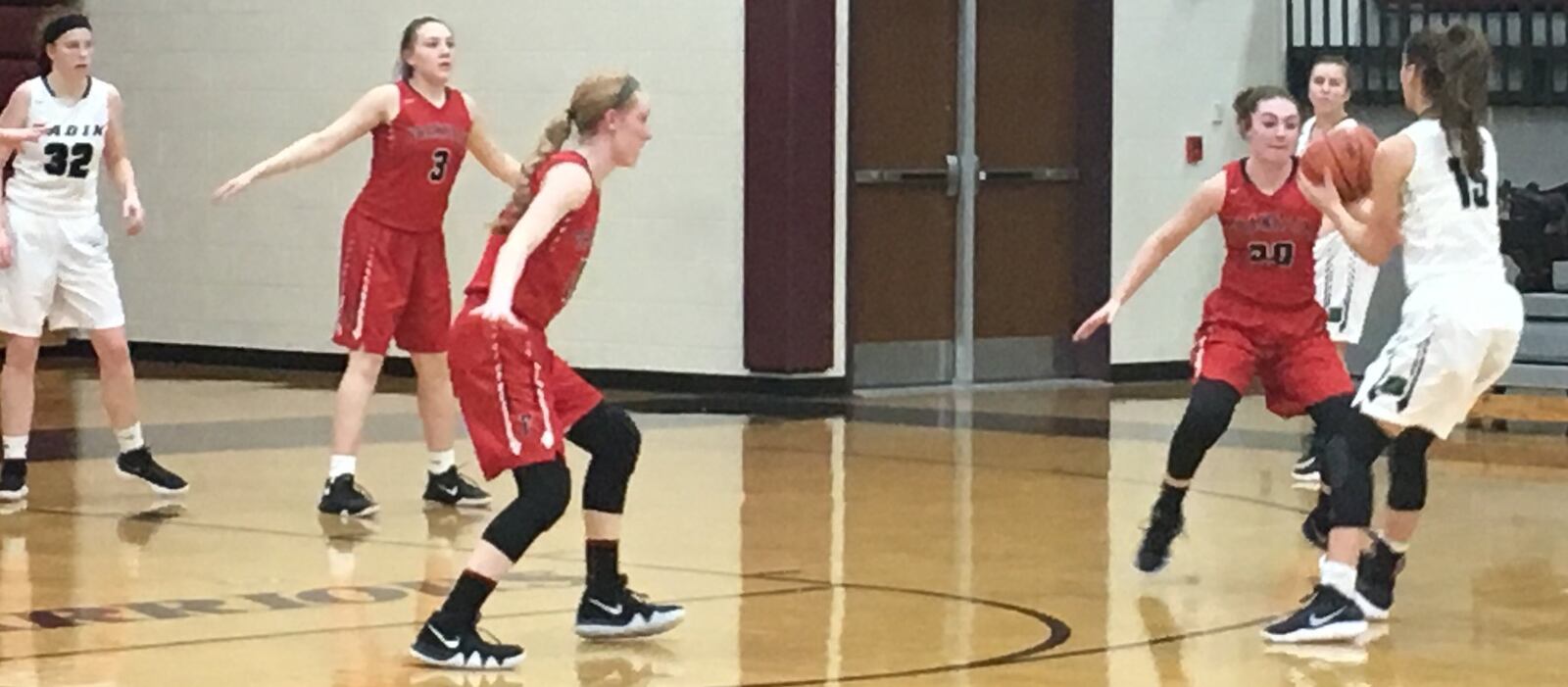 Kaylee Harris (3), Jordan Rogers (middle) and Skyler Weir (20) provide defense for Franklin as Badin’s Grace Larkin (15) handles the ball during Tuesday night’s Division II sectional semifinal at Lebanon. RICK CASSANO/STAFF