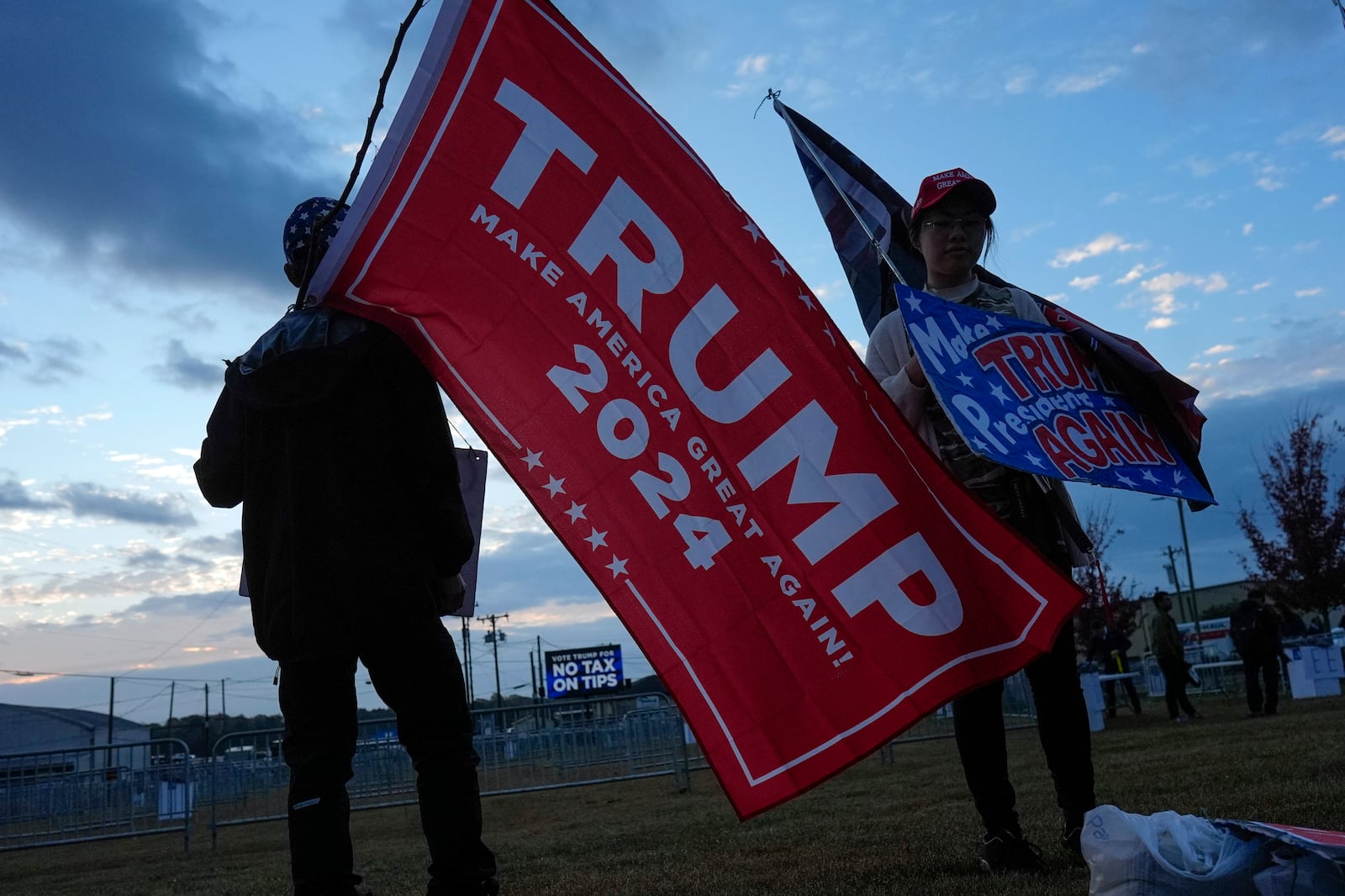 Supporters arrive before Republican presidential nominee former President Donald Trump speaks at a campaign rally in Gastonia, N.C., Saturday, Nov. 2, 2024. (AP Photo/Chris Carlson)