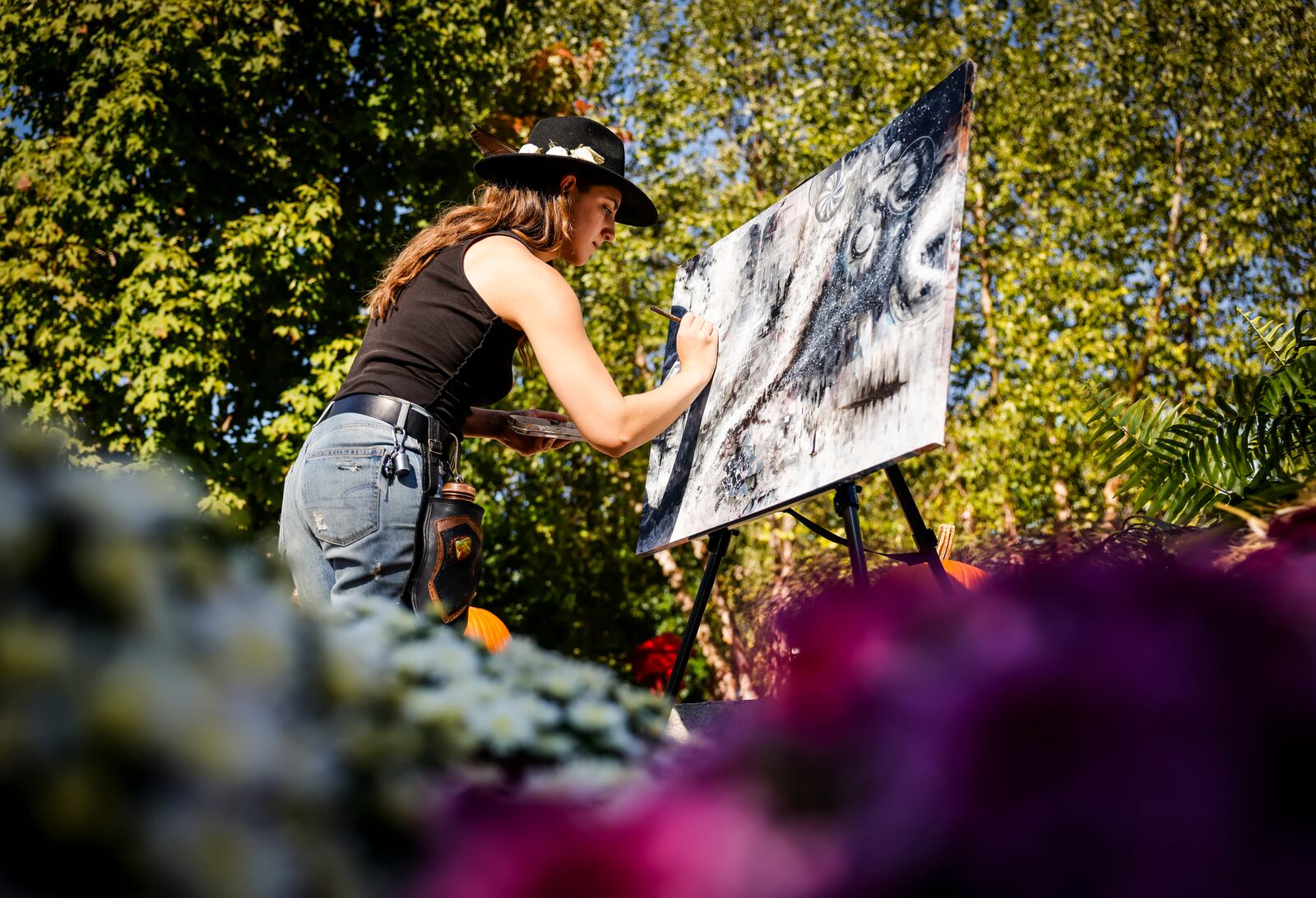 Pictured in this October 2023 file photo is local artist Anya Spinazzola working on a painting at Rotary Park during Operation Pumpkin 2023. NICK GRAHAM/FILE