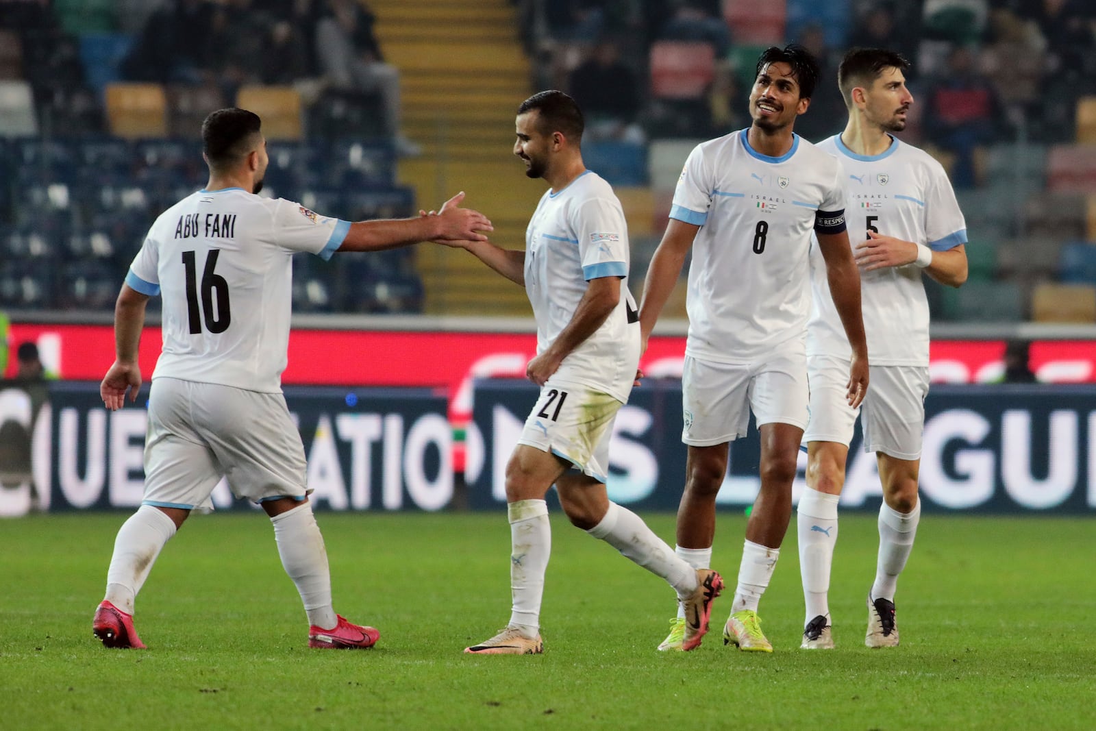 Israel's Mohammad Abu Fani celebrates after scoring his side's first goal during the UEFA Nations League soccer match between Italia and Israel at the Bluenergy Stadium in Udine, Italy, Monday, Oct. 14, 2024. (Andrea Bressanutti/LaPresse via AP)