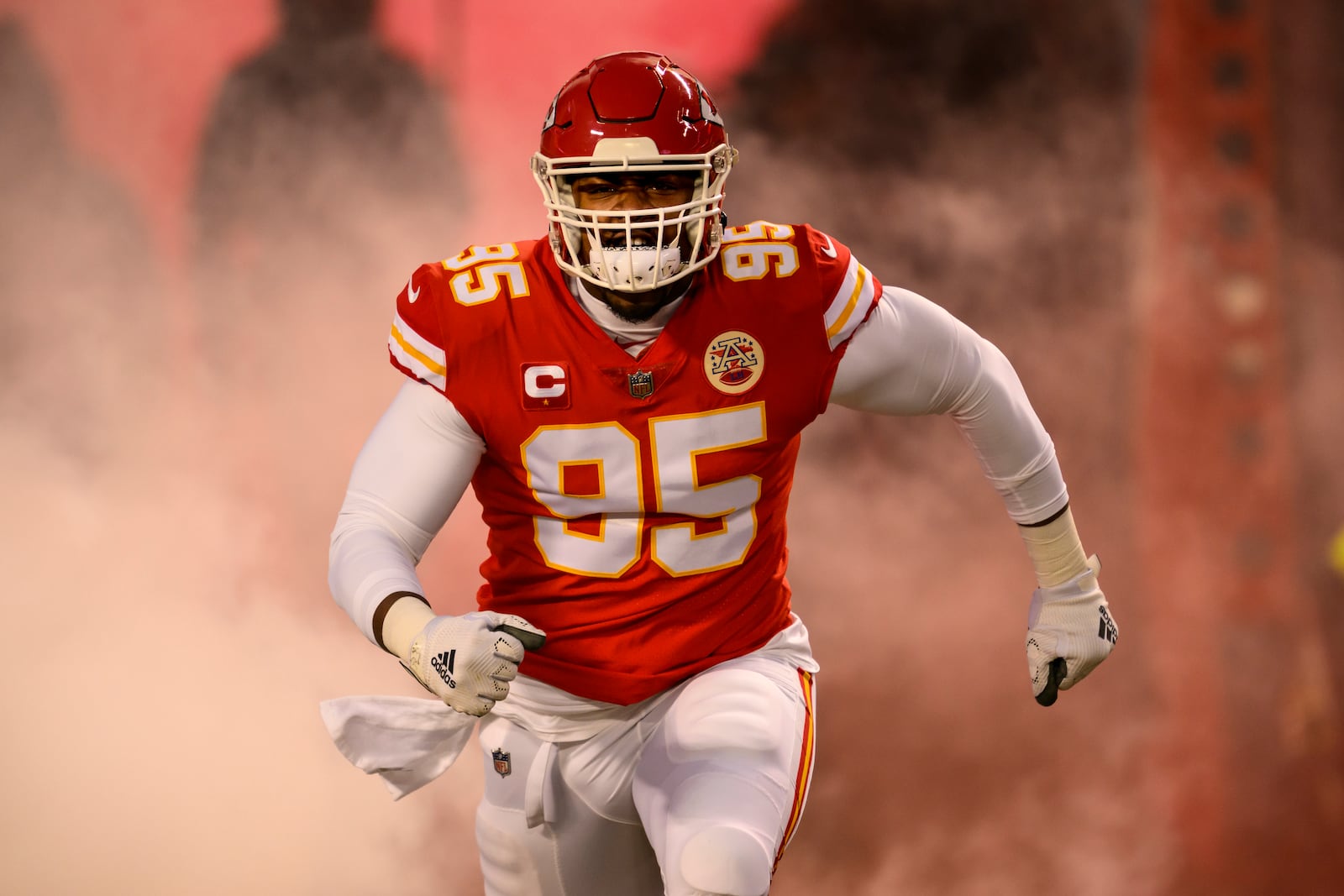 FILE - Kansas City Chiefs defensive tackle Chris Jones comes onto the field during introductions before playing the Cincinnati Bengals in the NFL AFC Championship playoff football game, Sunday, Jan. 29, 2023 in Kansas City, Mo.  (AP Photo/Reed Hoffmann, File)