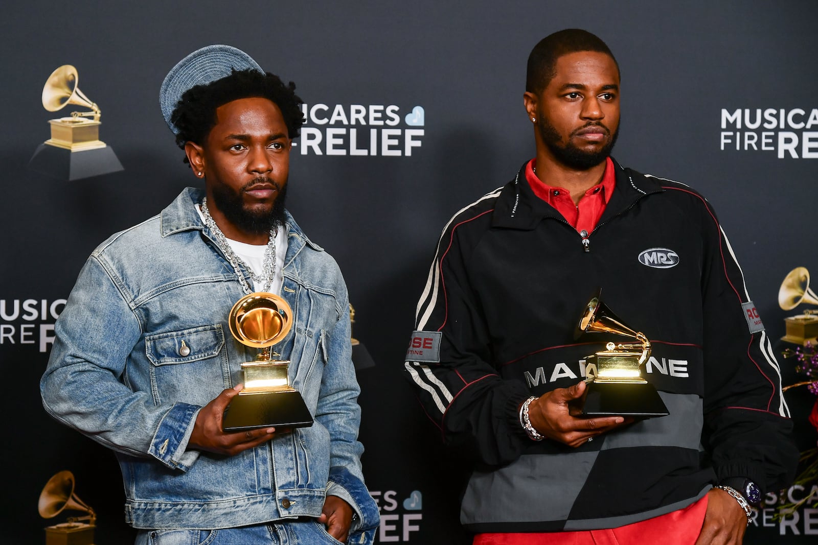 Kendrick Lamar , left, and Dave Free pose in the press room with the award for best music video for "Not Like Us," during the 67th annual Grammy Awards on Sunday, Feb. 2, 2025, in Los Angeles. (Photo by Richard Shotwell/Invision/AP)