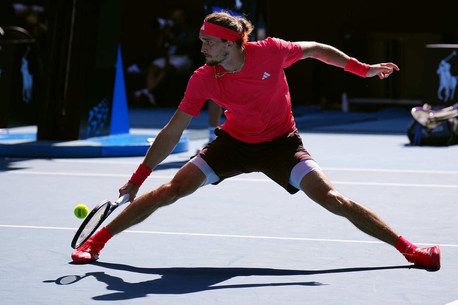 Alexander Zverev of Germany plays a backhand return to Tommy Paul of the U.S. during their quarterfinal match at the Australian Open tennis championship in Melbourne, Australia, Tuesday, Jan. 21, 2025. (AP Photo/Vincent Thian)