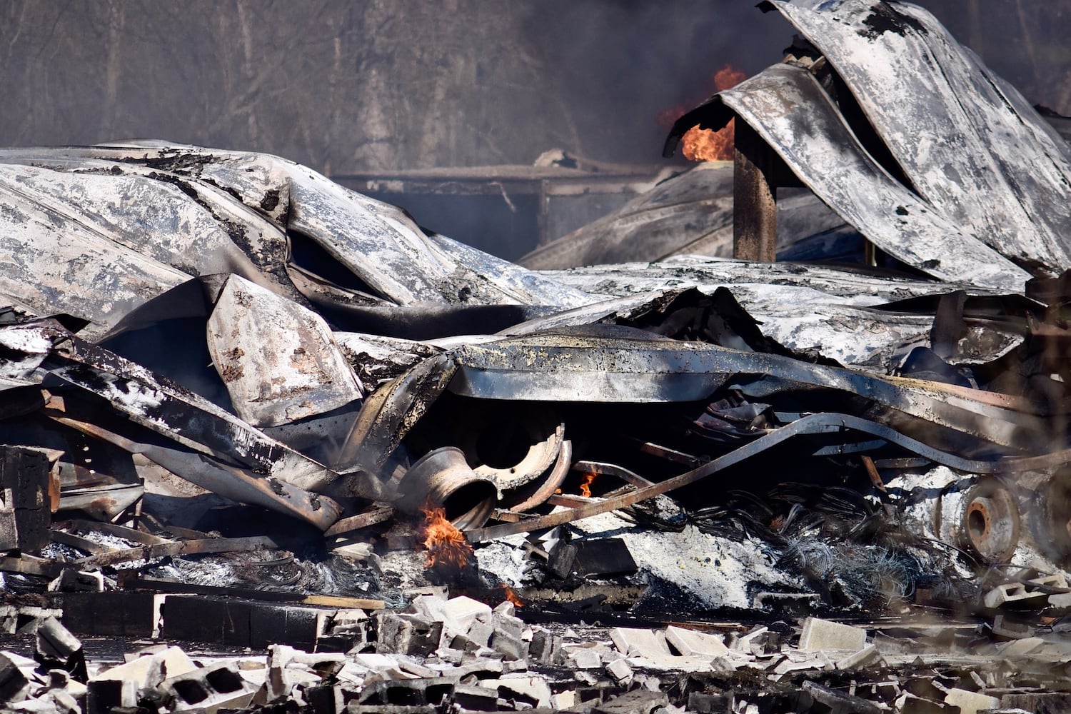 PHOTOS Massive fire at Wholesale Tire Mart in Morgan Township