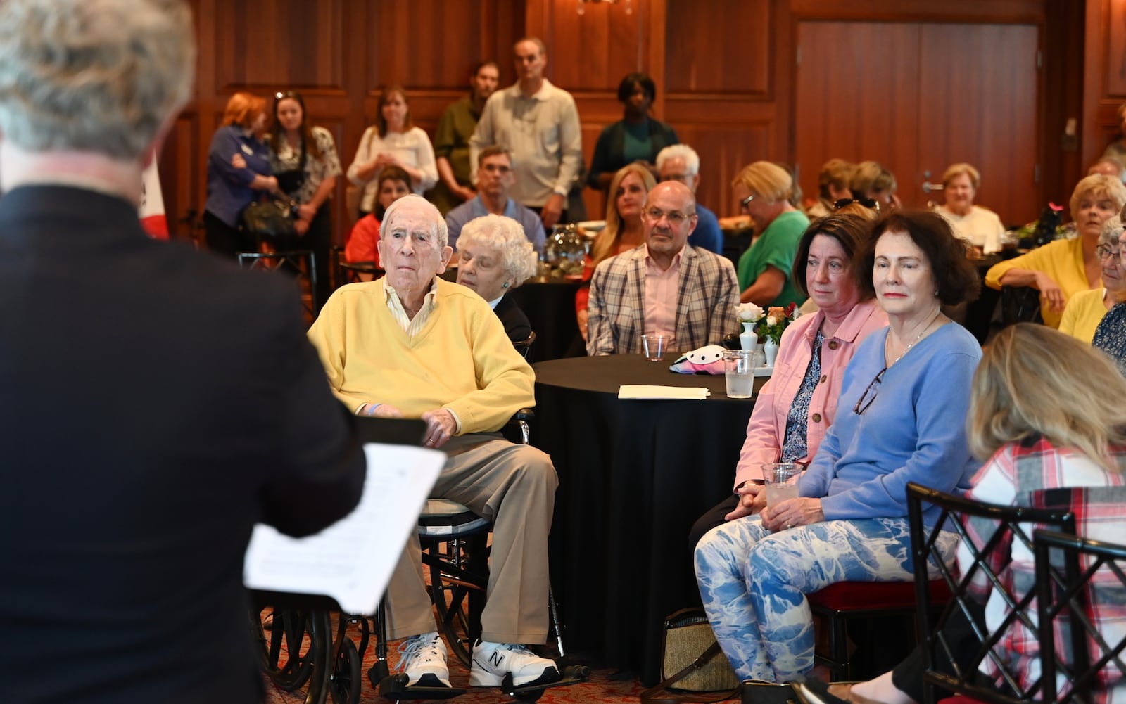 The Hamilton Community Foundation and the city of Hamilton honored Dave Belew, known by many as Mr. Hamilton, with a ceremony on Friday afternoon, May 10, 2024, that formally dedicated the portion of the Great Miami River Trail in the city with the honorary name the Dave Belew Trail. Belew, 92, was the driving force behind getting the trail built in the city. Pictured is Belew, a musician himself, listening to a contingent of the Butler Philharmonic Orchestra play some of his favorite music. MICHAEL D. PITMAN/STAFF