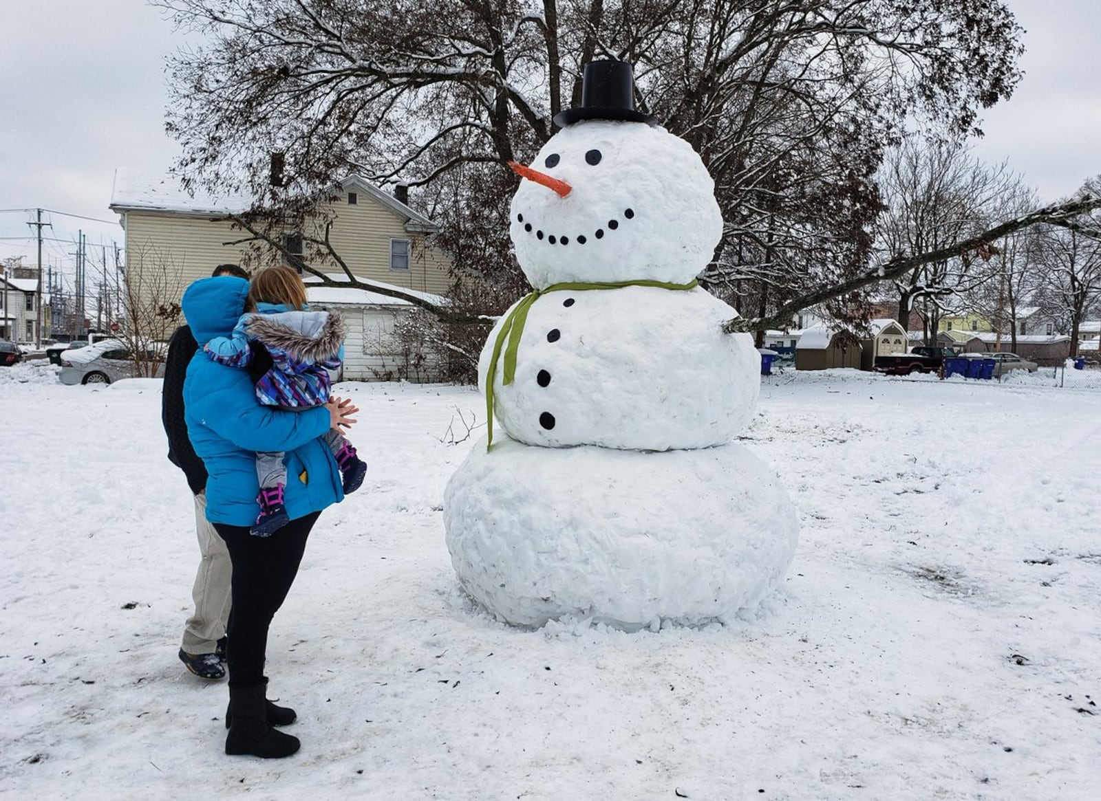 A large snowman was on display at the corner of Seventh and Buckeye streets in Hamilton on Monday, Jan. 14, 2019. NICK GRAHAM / STAFF