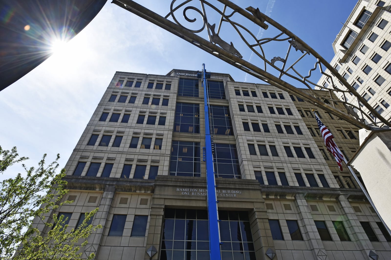 Hamilton city government, centered at the One Renaissance Center building on High Street adjacent to the Butler County Government Services Center, recently laid off its assistant law director, with plans to lay off three in its nursing division. NICK GRAHAM/STAFF