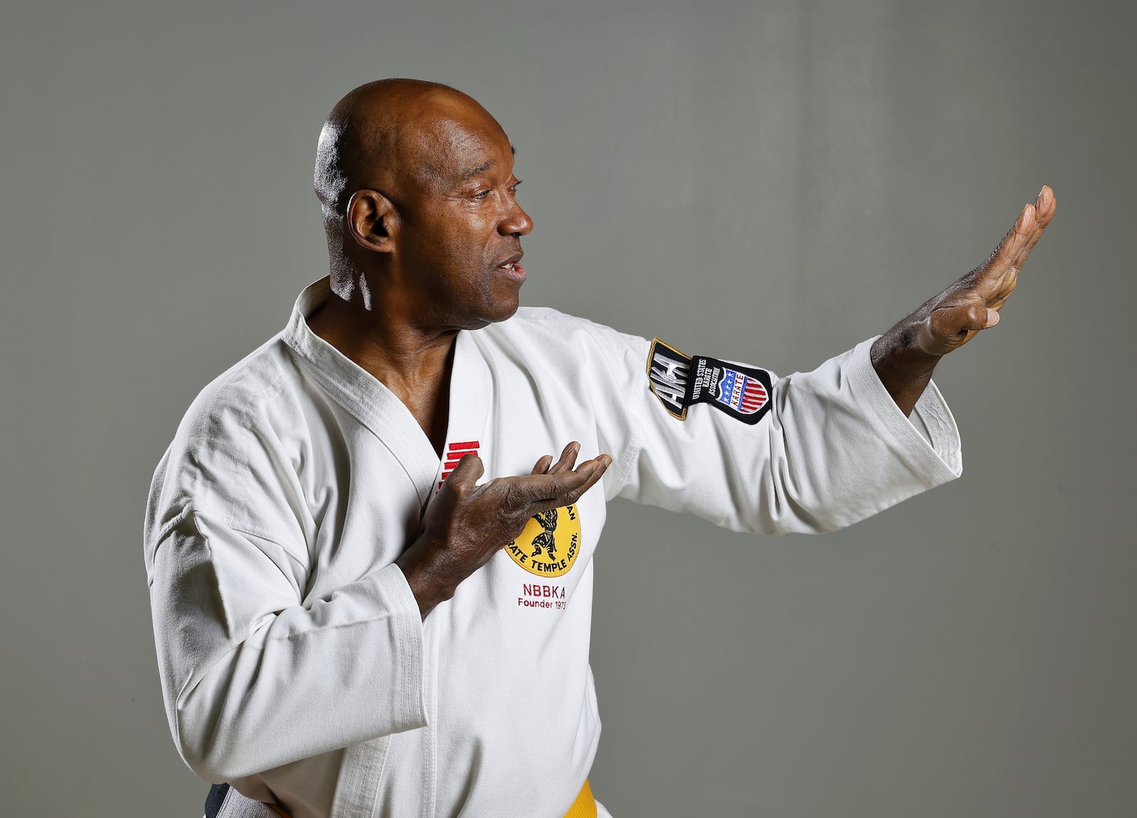 Lifelong Hamilton resident Bob “Moo Duk Kwan” Harris has been teaching karate since 1969, including more than 35 years of teaching at the Hamilton YMCA and his own studio. He has reached Supreme Nim Grand Master status in karate and and is a two-time national champion. Harris operates his photography business and Moo Duk Kwan Karate Temple at his South Second Street studio. NICK GRAHAM/STAFF