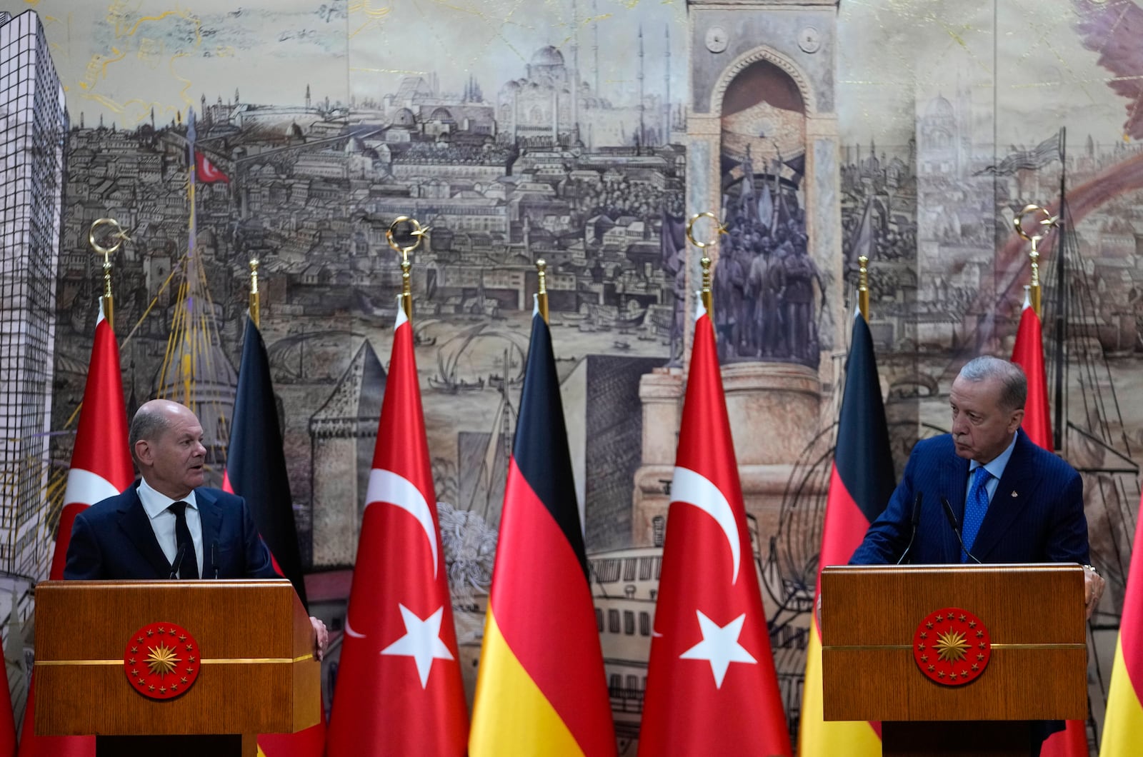 Turkey's President Recep Tayyip Erdogan, right, hold a press conference with Germany's Chancellor Olaf Scholz, in Istanbul, Turkey, Saturday, Oct. 19, 2024. (AP Photo/Khalil Hamra)