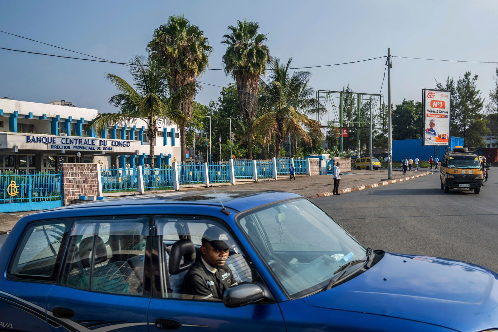 A driver passes the Central Bank of Congo in downtown Goma, Democratic Republic of Congo, Thursday, Feb. 27, 2025, one month after Rwanda-backed M23 rebels captured the city. (AP Photo/Moses Sawasawa)