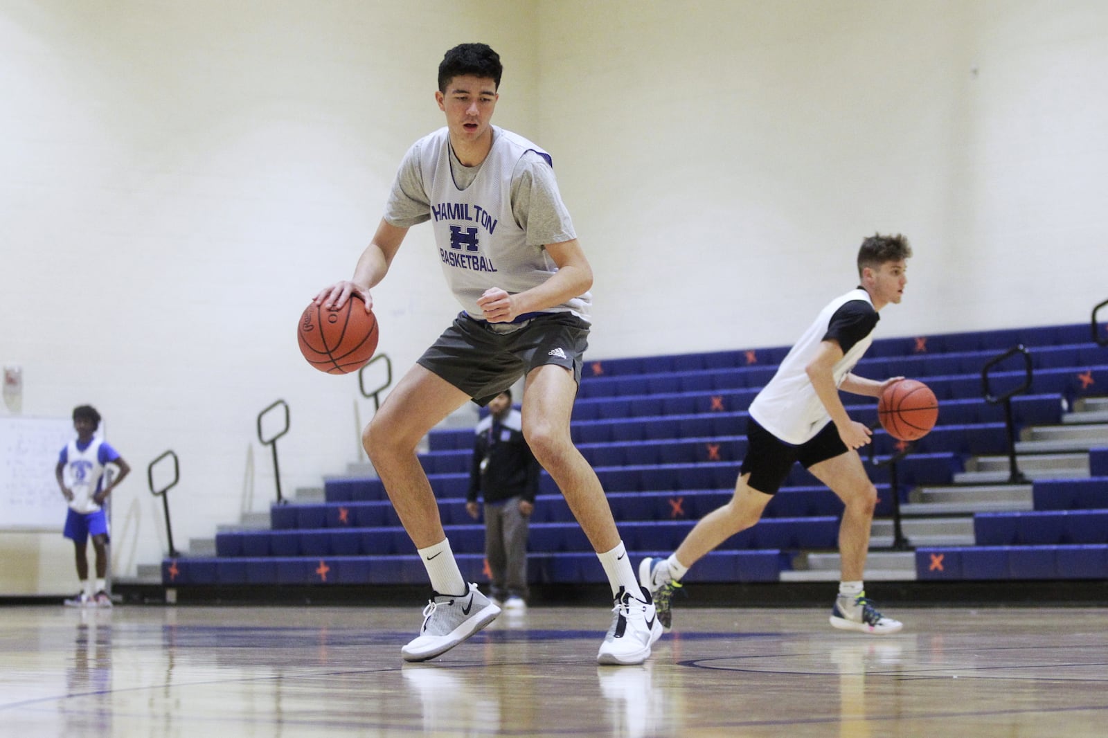 Sage Tolentino, a 210-pound, 7-foot junior from Hawaii is playing basketball for Hamilton High School this season. Tolentino ended up in Hamilton after sports in Hawaii were cancelled due to the coronavirus. He has verbally committed to play college basketball for Bruce Pearl at Auburn University. NICK GRAHAM / STAFF