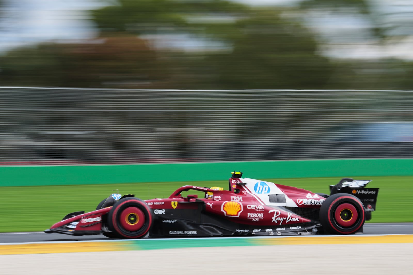 Ferrari driver Lewis Hamilton of Britain steers his car during qualifying at the Australian Formula One Grand Prix at Albert Park, in Melbourne, Australia, Saturday, March 15, 2025. (AP Photo/Heath McKinley)