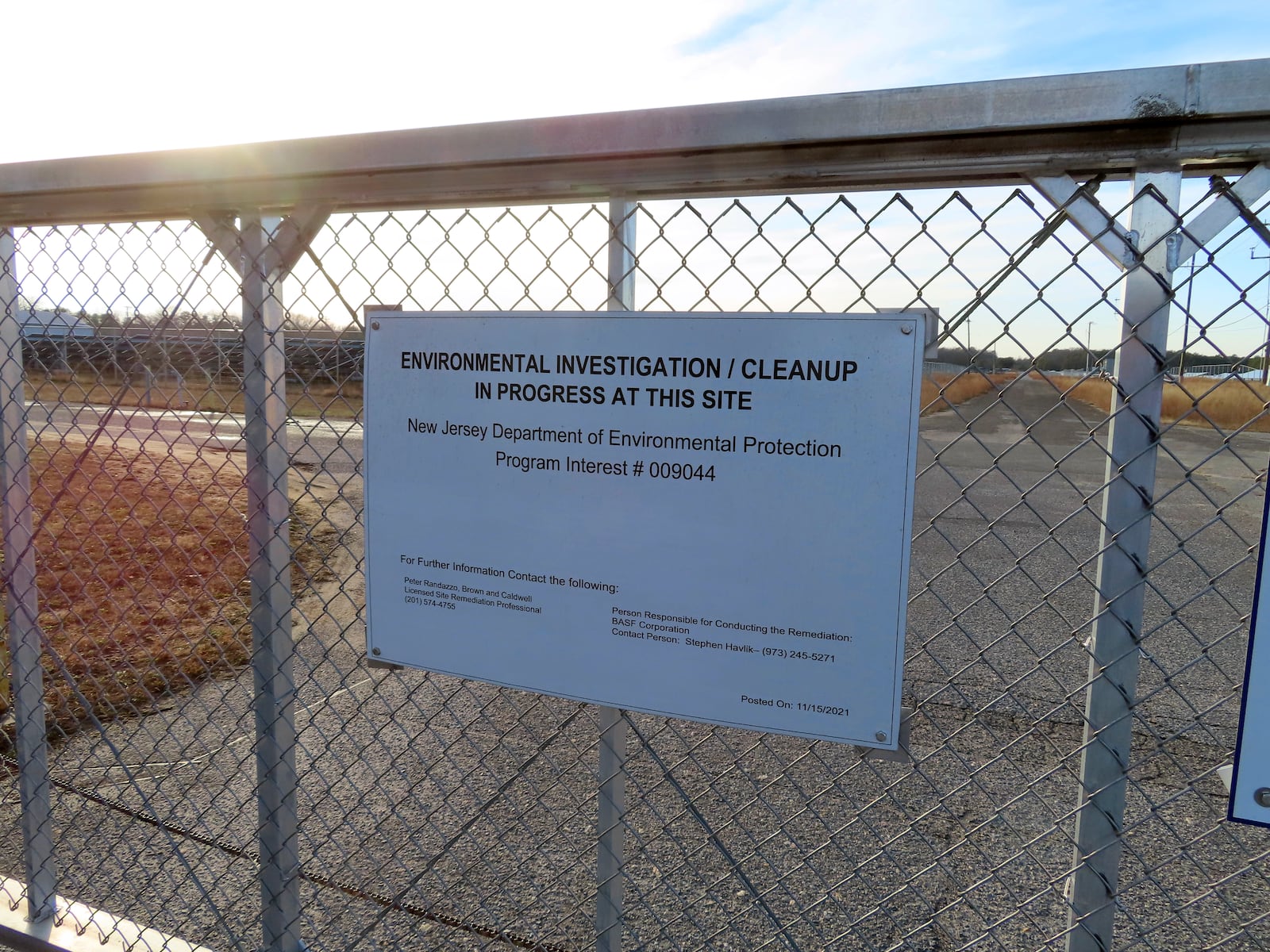 A gate blocks entrance to the former Ciba-Geigy chemical plant Dec. 17, 2024, in Toms River, N.J., one of America's worst toxic waste sites. (AP Photo/Wayne Parry)