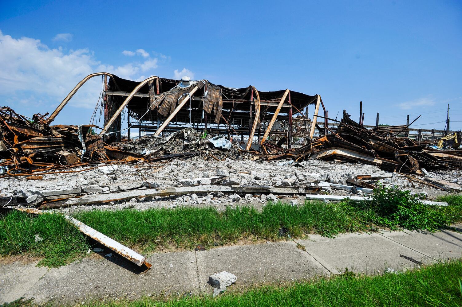 Crews demolish warehouse after massive fire in Hamilton