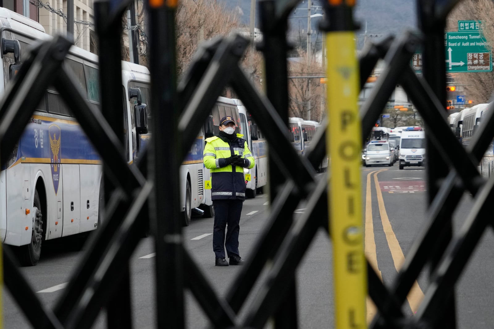 A police officer stands guard near the Constitutional Court in Seoul, South Korea, Tuesday, Feb. 25, 2025. (AP Photo/Ahn Young-joon)