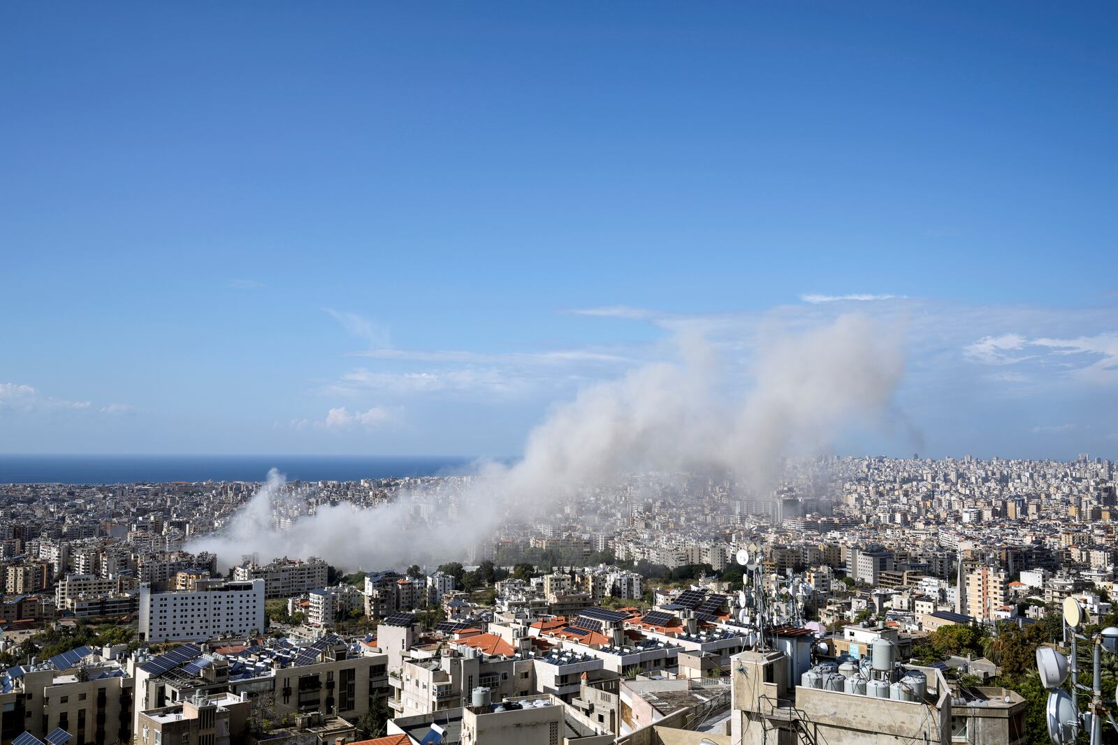 Smoke rises after an Israeli airstrike on Dahiyeh, in the southern suburb of Beirut, Lebanon, Thursday, Nov. 21, 2024. (AP Photo/Bilal Hussein)