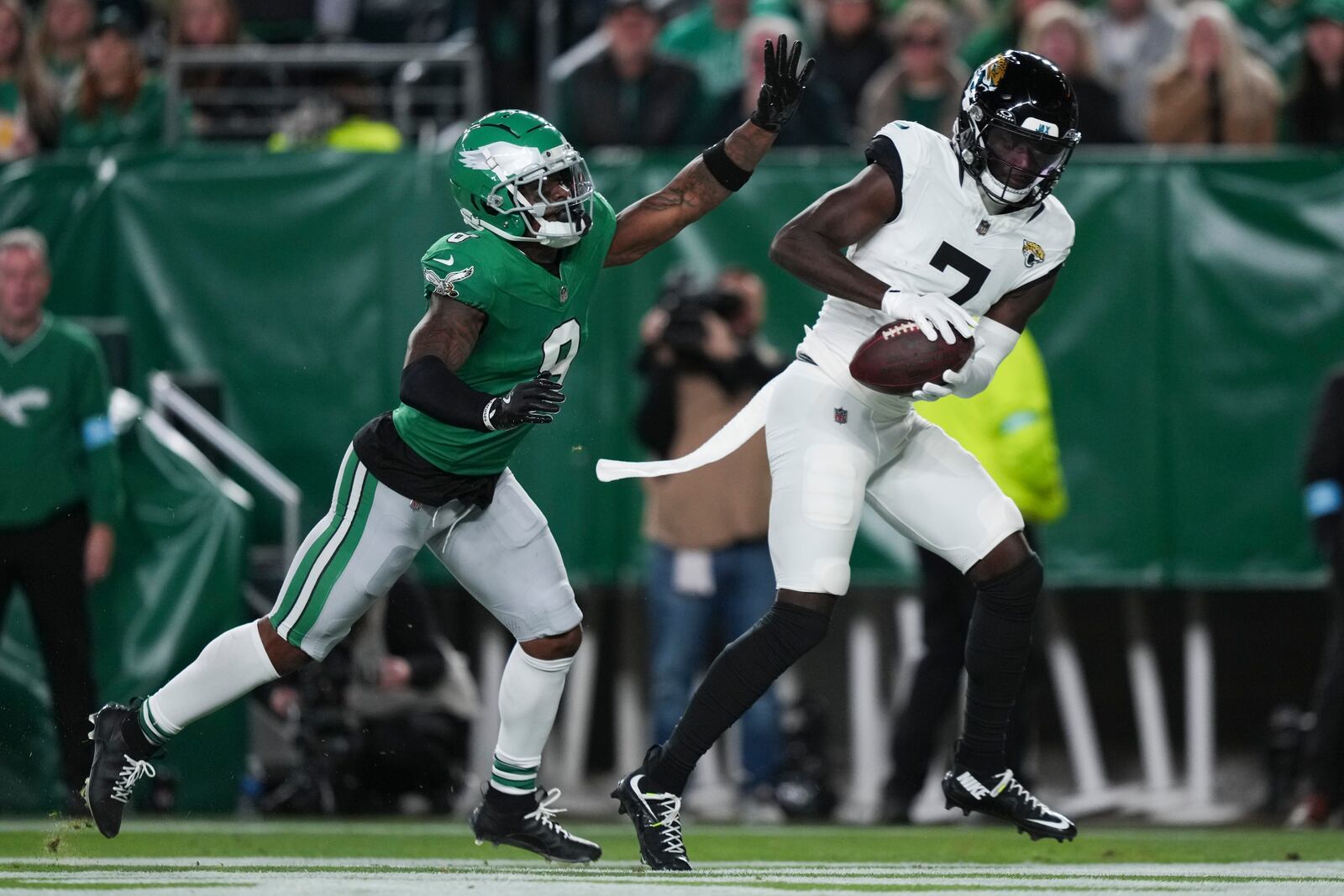 Jacksonville Jaguars wide receiver Brian Thomas Jr. (7) scores a two-point conversion in front of Philadelphia Eagles safety C.J. Gardner-Johnson (8) during the second half of an NFL football game Sunday, Nov. 3, 2024, in Philadelphia. (AP Photo/Matt Slocum)