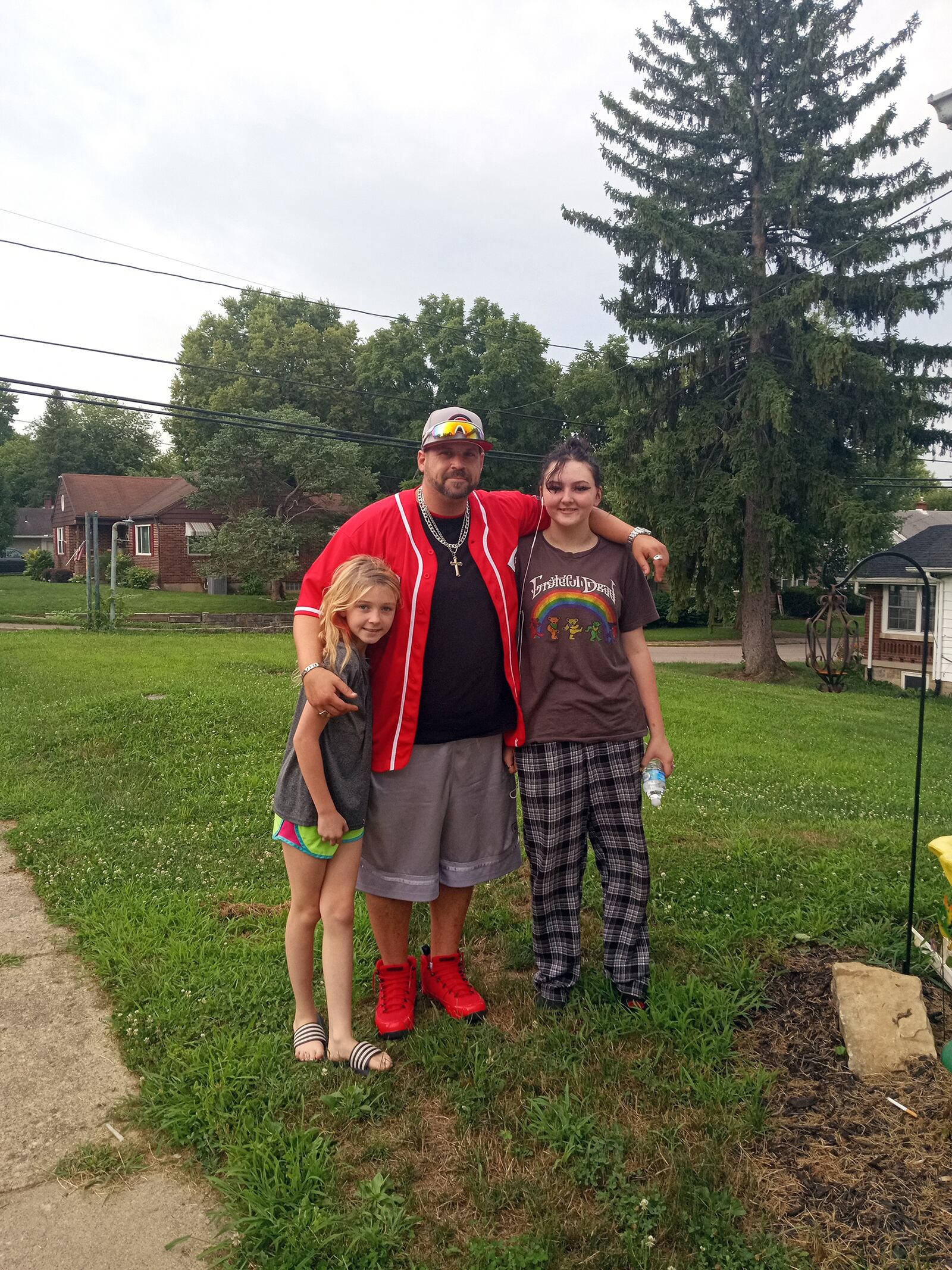 Katz (center) with his daughters Jayla (Left) and Jaymi. His relationship with his children and their mother has improved after he overcame years of his drug addiction struggles.