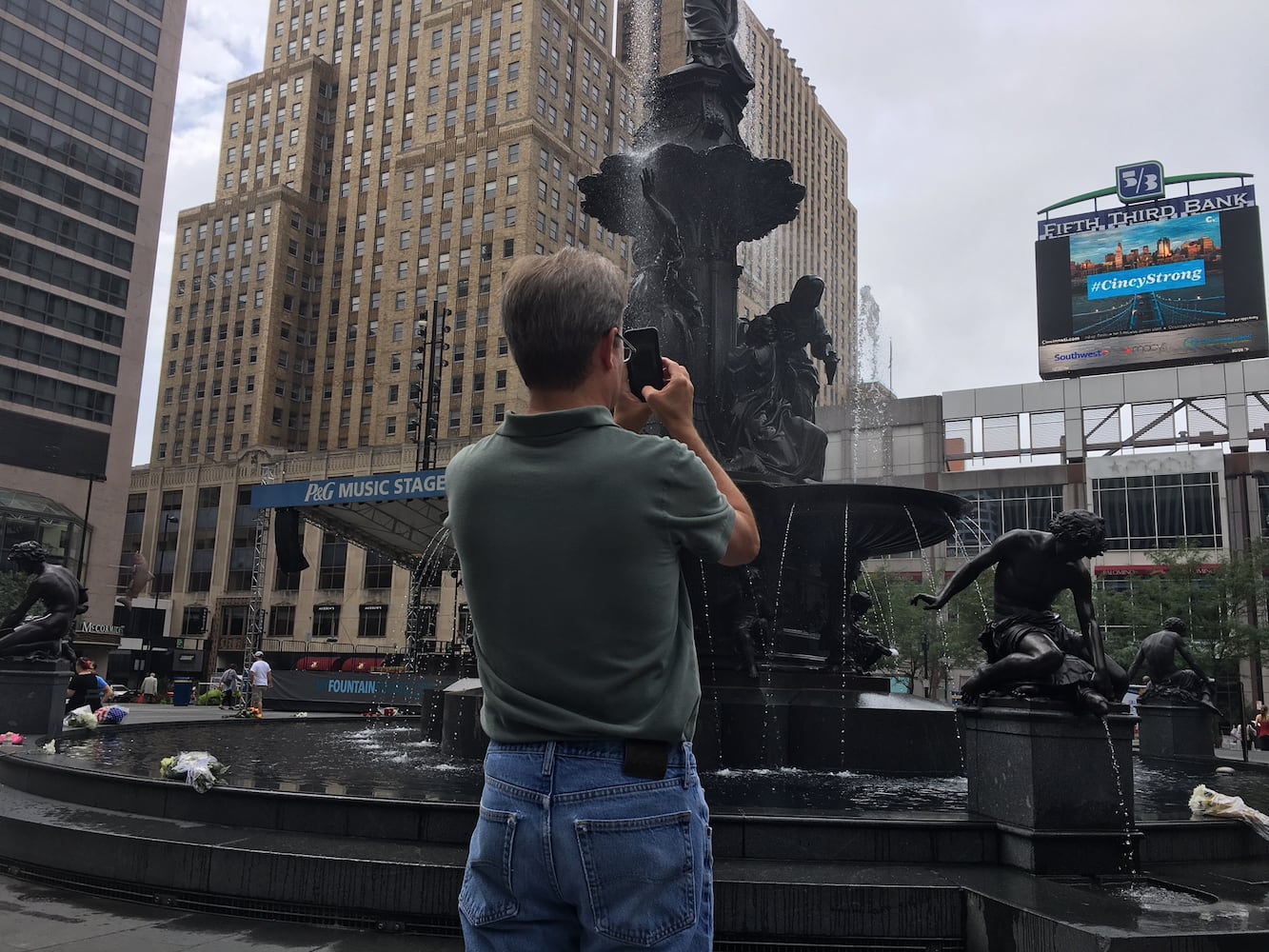 Photos: Locals honor three killed day after Fountain Square shooting