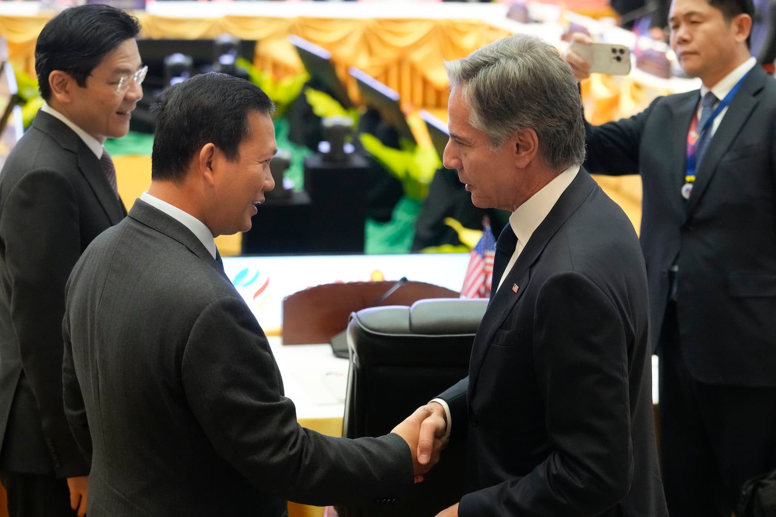 U.S. Secretary of State Antony Blinken, second from right, is greeted by Cambodian Prime Minister Hun Manet during the 12th Association of Southeast Asian Nations (ASEAN) -U.S. Summit in Vientiane, Laos, Friday, Oct. 11, 2024. (AP Photo/Dita Alangkara)