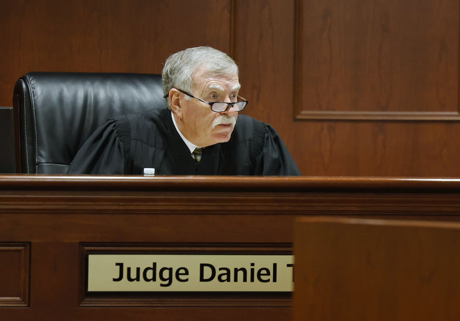 Visiting Judge Daniel Hogan speaks to potential jurors in the criminal trial of Butler County Auditor Roger Reynolds starting in Butler County Common Pleas Court super courtroom Monday, Dec. 12, 2022 in Hamilton. NICK GRAHAM/STAFF