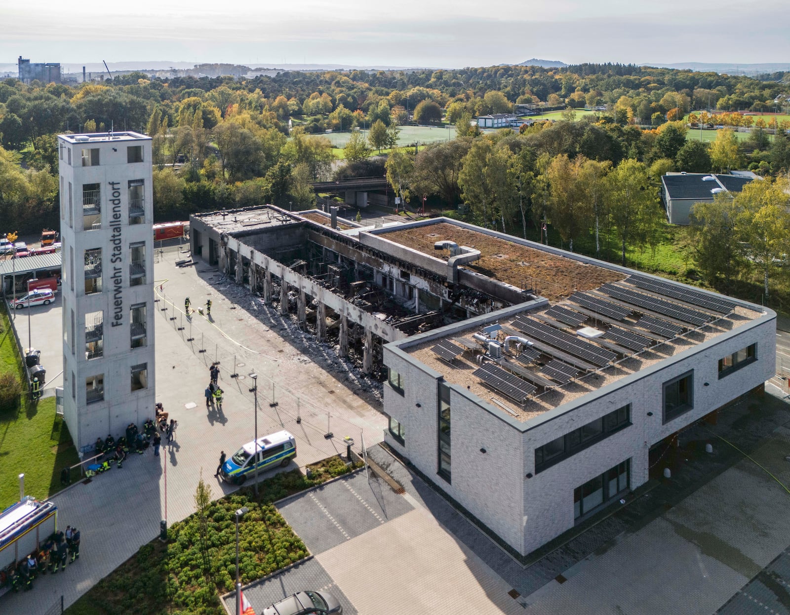 Firefighters work on the site of a fire in a vehicle depot in Stadtallendorf, Germany, Wednesday Oct. 16, 2024. (Andreas Arnold/dpa via AP)