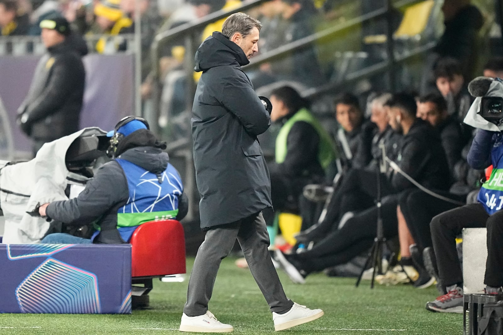 Dortmund's head coach Niko Kovac walks during the Champions League playoff second leg soccer match between Borussia Dortmund and Sporting CP at the Signa-Iduna Park in Dortmund, Germany, Wednesday, Feb. 19, 2025. (AP Photo/Martin Meissner)