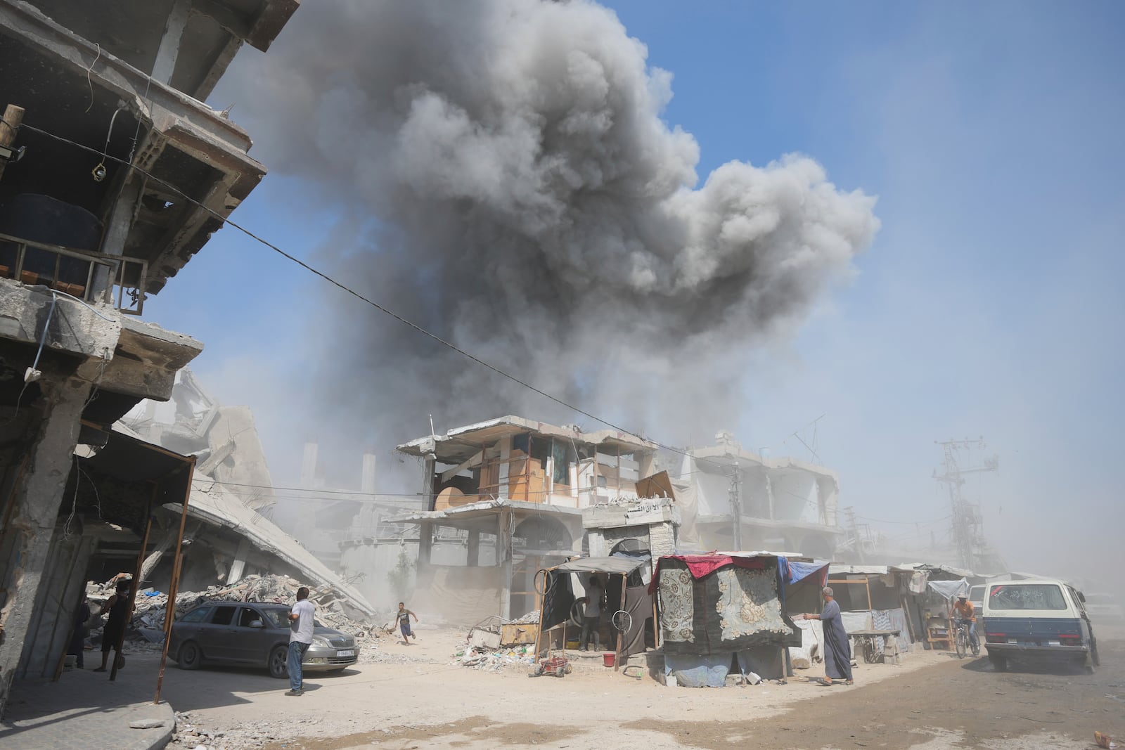 FILE - Smoke rises following Israeli bombardments in Khan Younis, Gaza Strip, on July 22, 2024. (AP Photo/Abdel Kareem Hana, File)